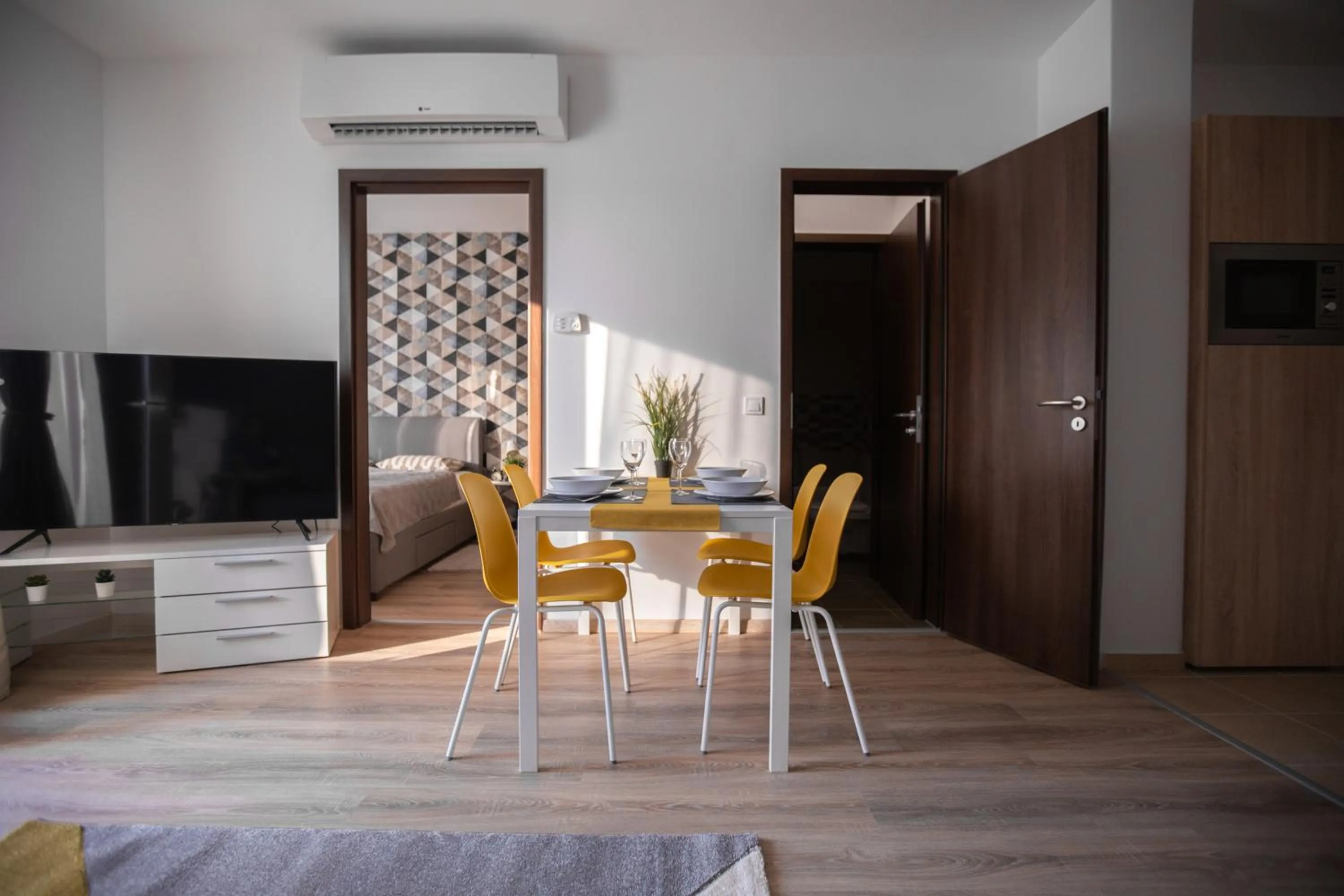 Communal lounge/ TV room in Elisabeth Downtown Apartments by FirstHost