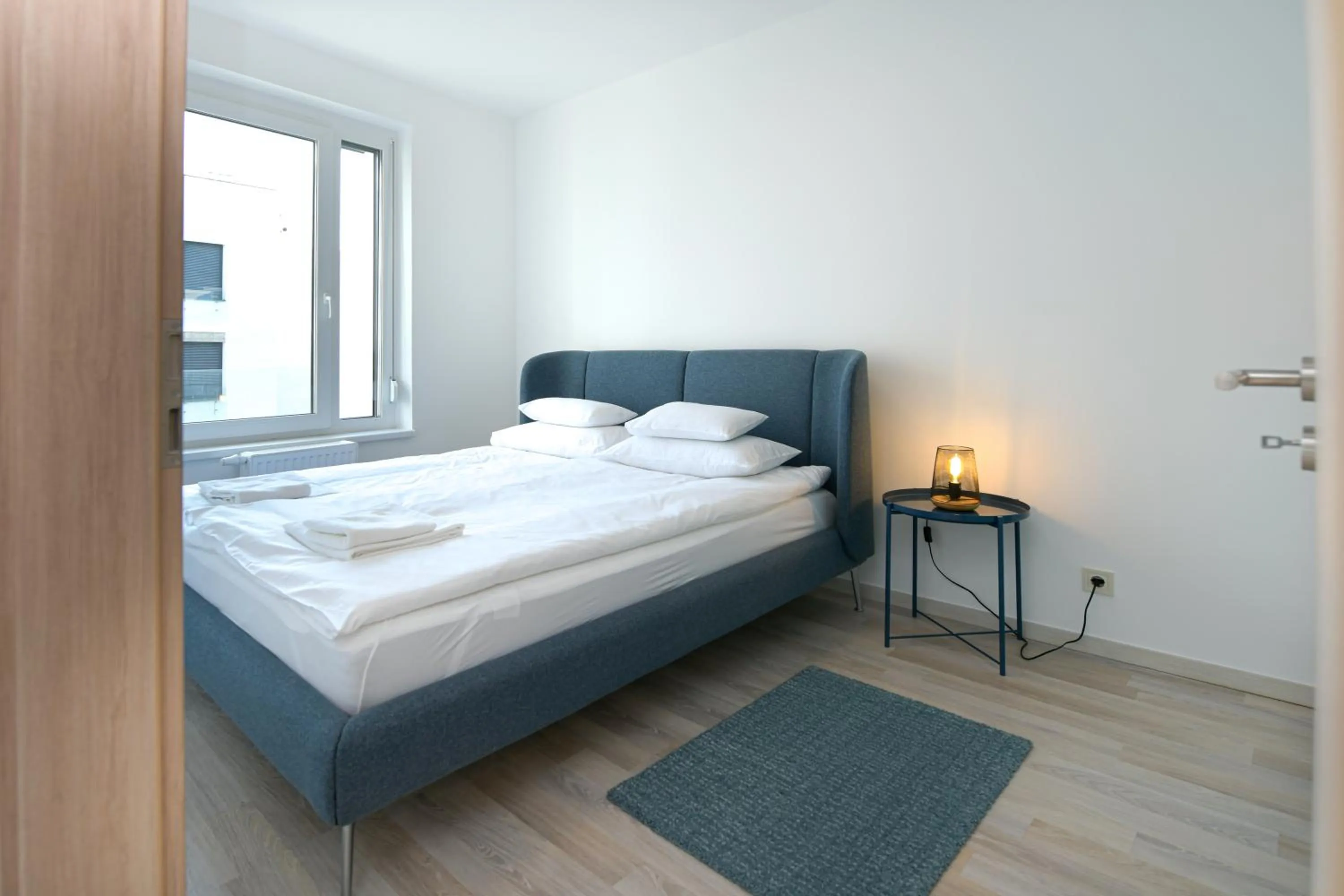 Bed in Elisabeth Downtown Apartments by FirstHost
