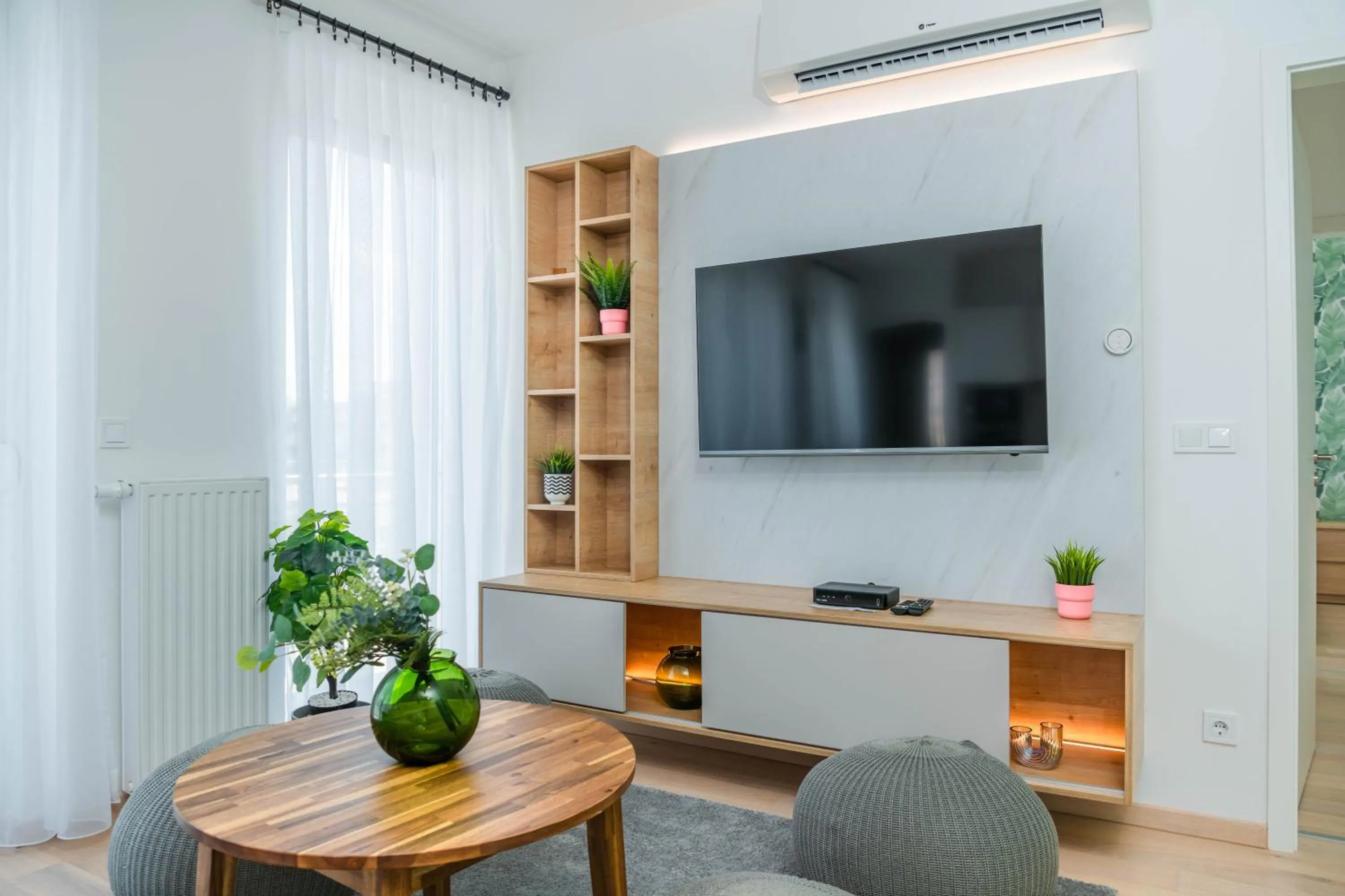 Communal lounge/ TV room in Elisabeth Downtown Apartments by FirstHost