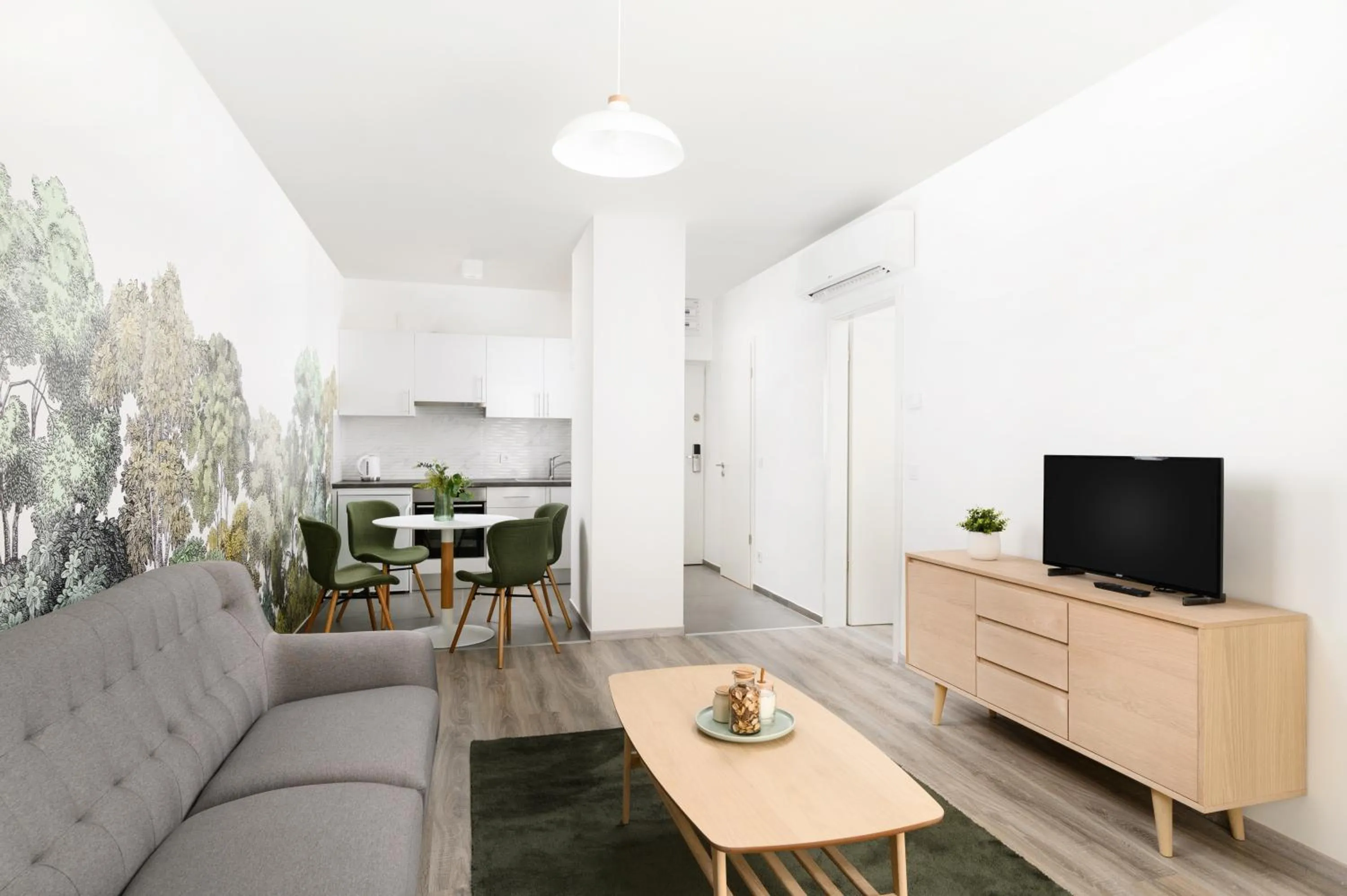 Communal lounge/ TV room in Elisabeth Downtown Apartments by FirstHost