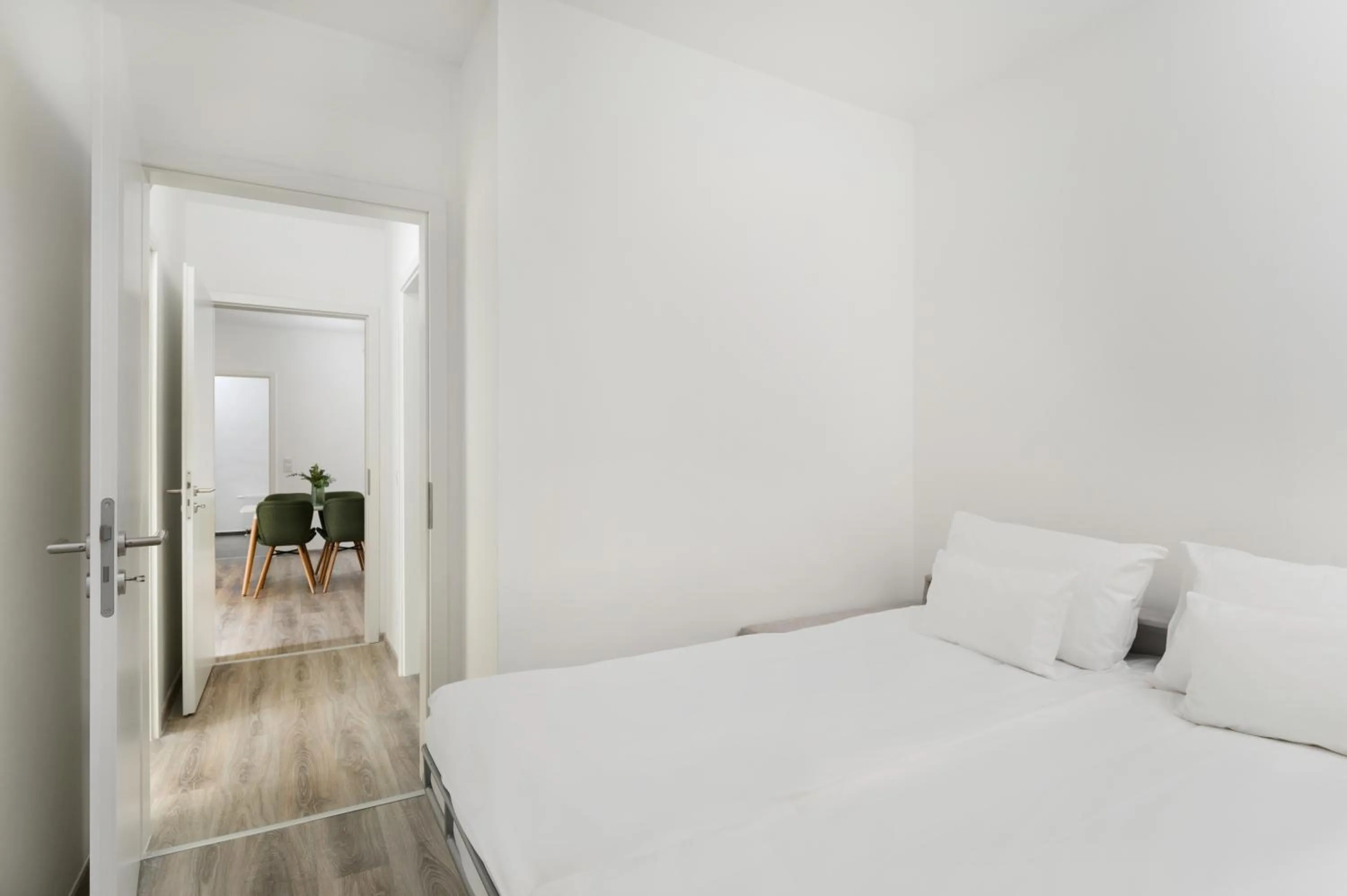 Bed in Elisabeth Downtown Apartments by FirstHost