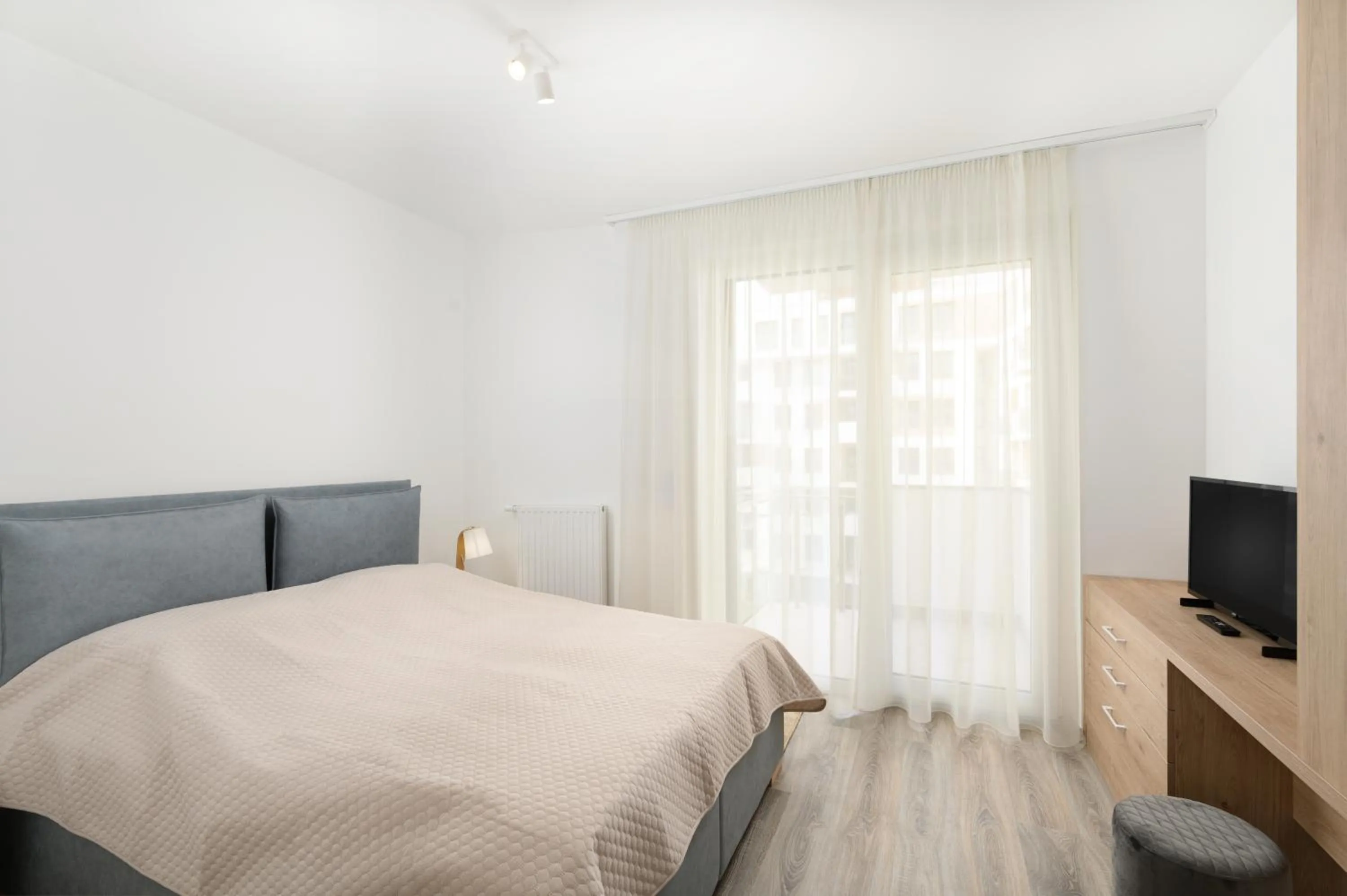 Bed in Elisabeth Downtown Apartments by FirstHost