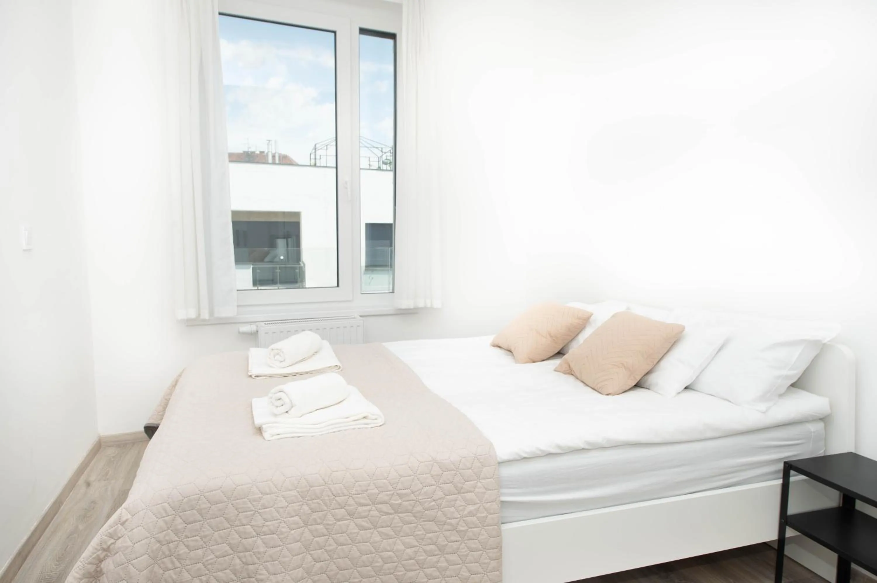 Bed in Elisabeth Downtown Apartments by FirstHost