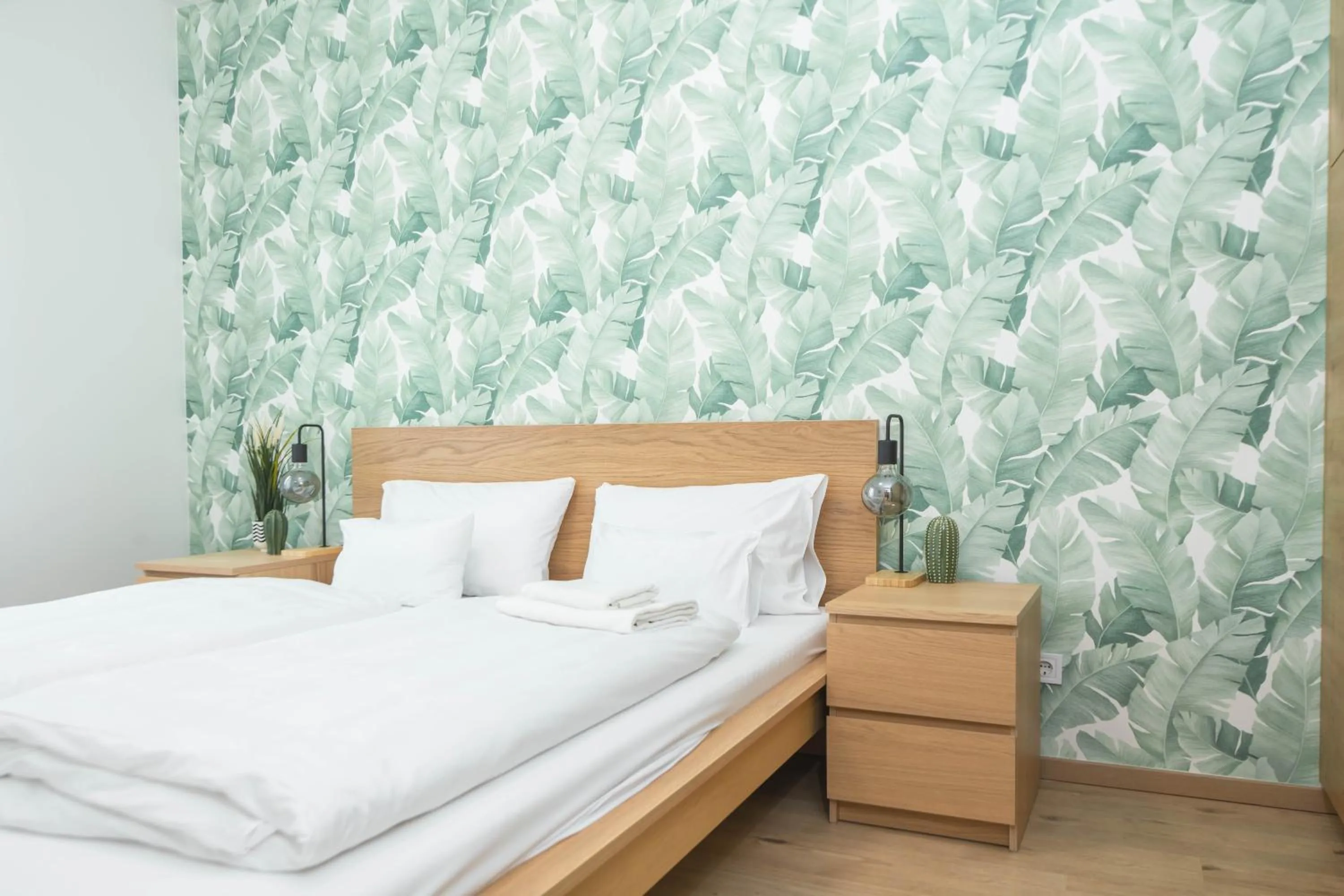 Bed in Elisabeth Downtown Apartments by FirstHost