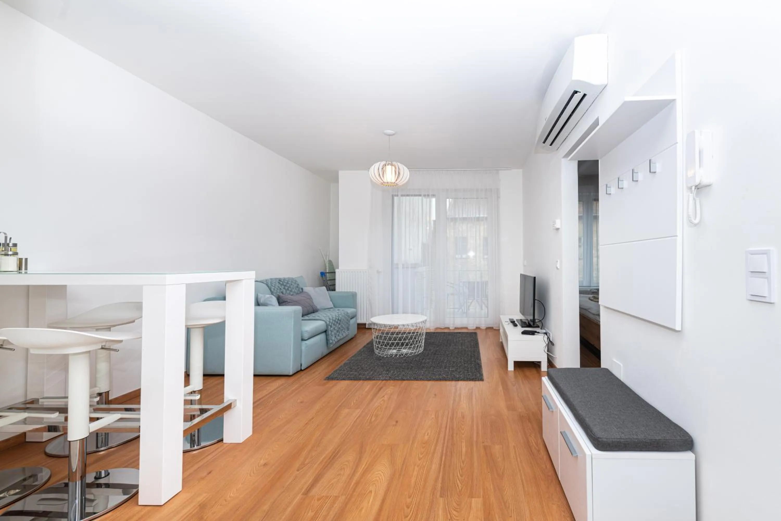 Communal lounge/ TV room in Elisabeth Downtown Apartments by FirstHost