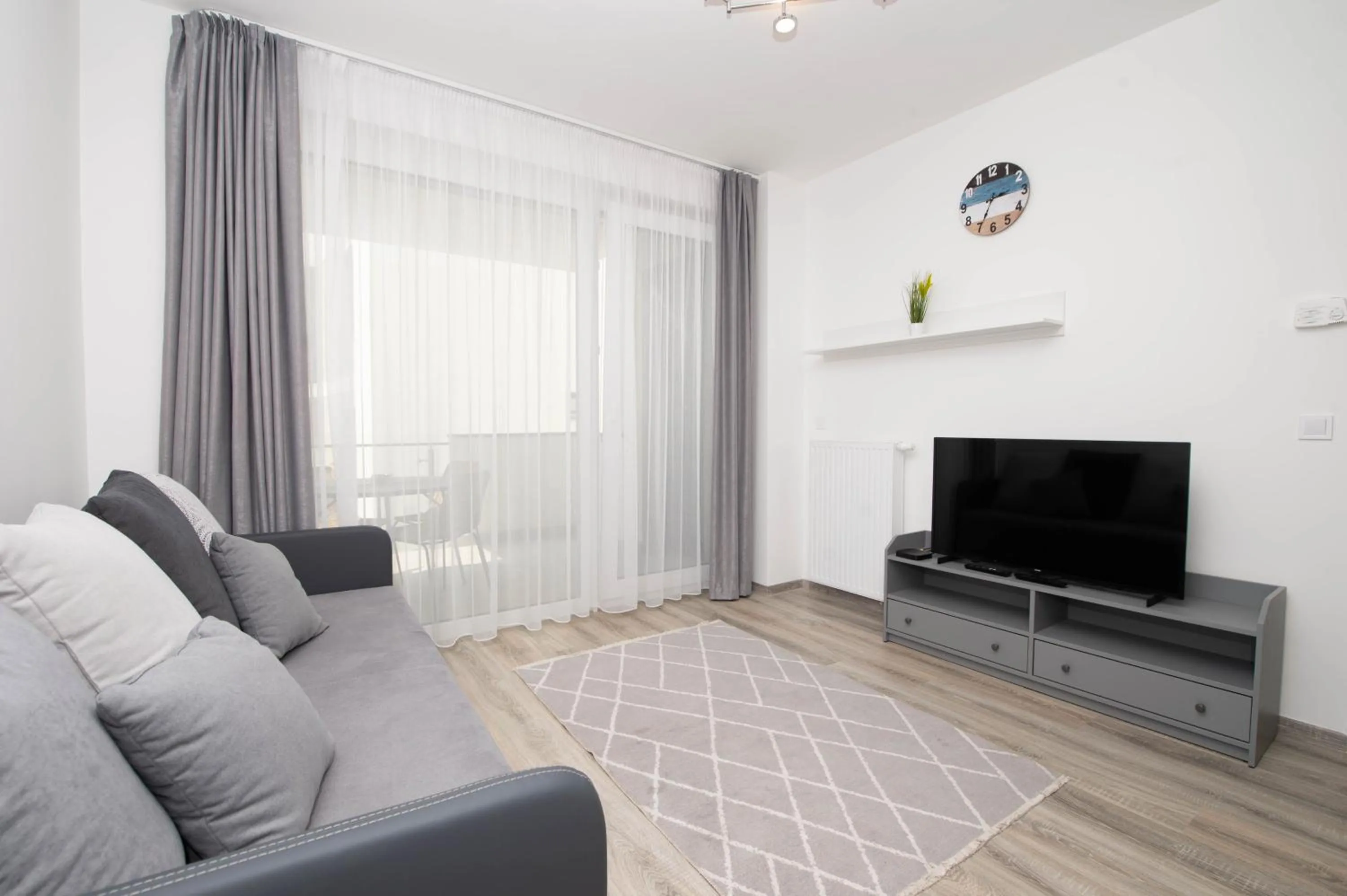 Communal lounge/ TV room in Elisabeth Downtown Apartments by FirstHost