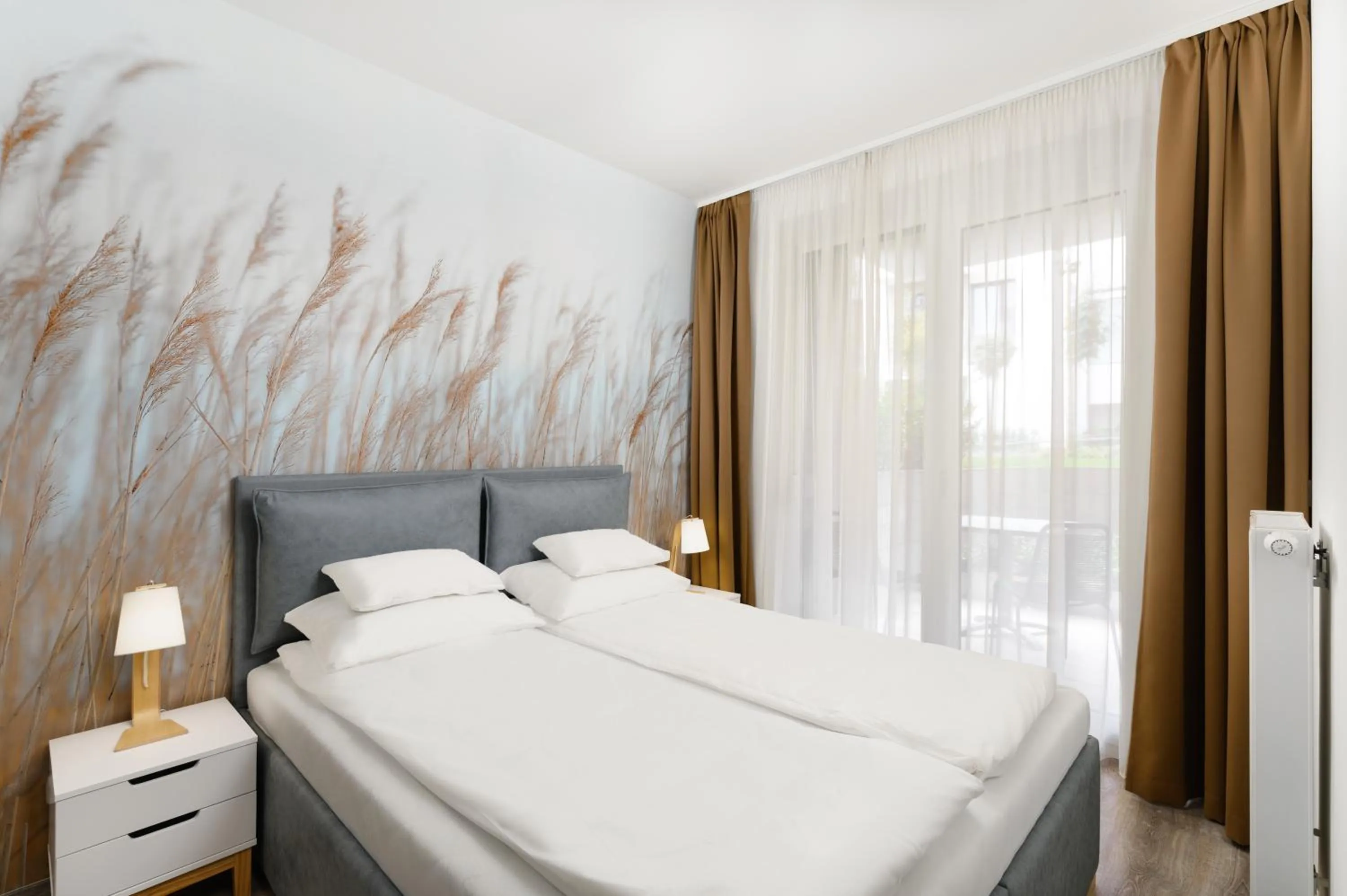 Bed in Elisabeth Downtown Apartments by FirstHost