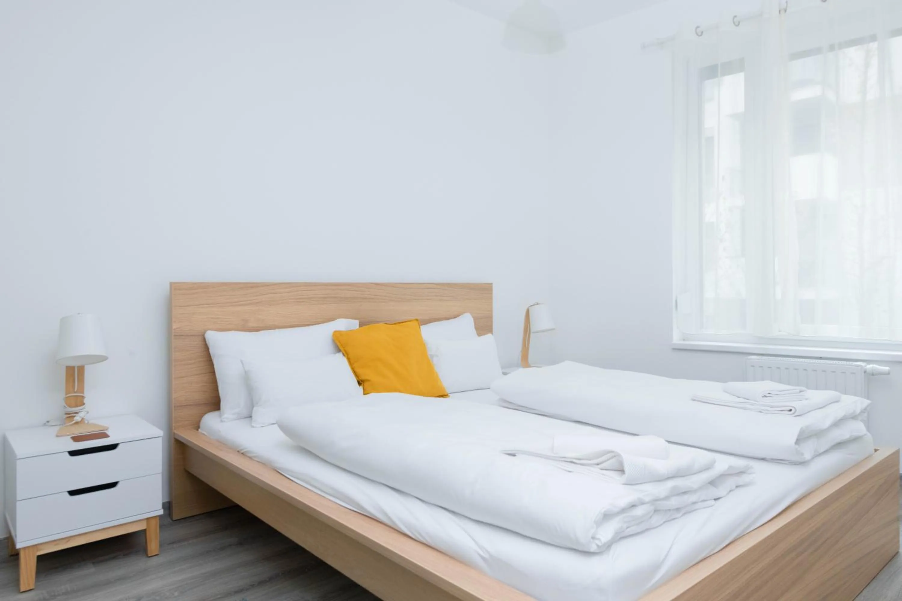 Bed in Elisabeth Downtown Apartments by FirstHost