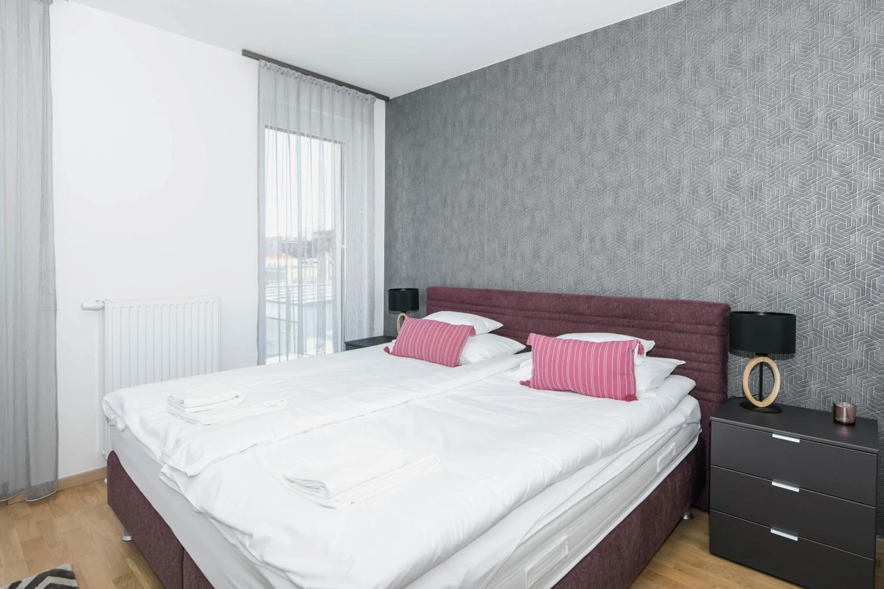 Bed in Elisabeth Downtown Apartments by FirstHost