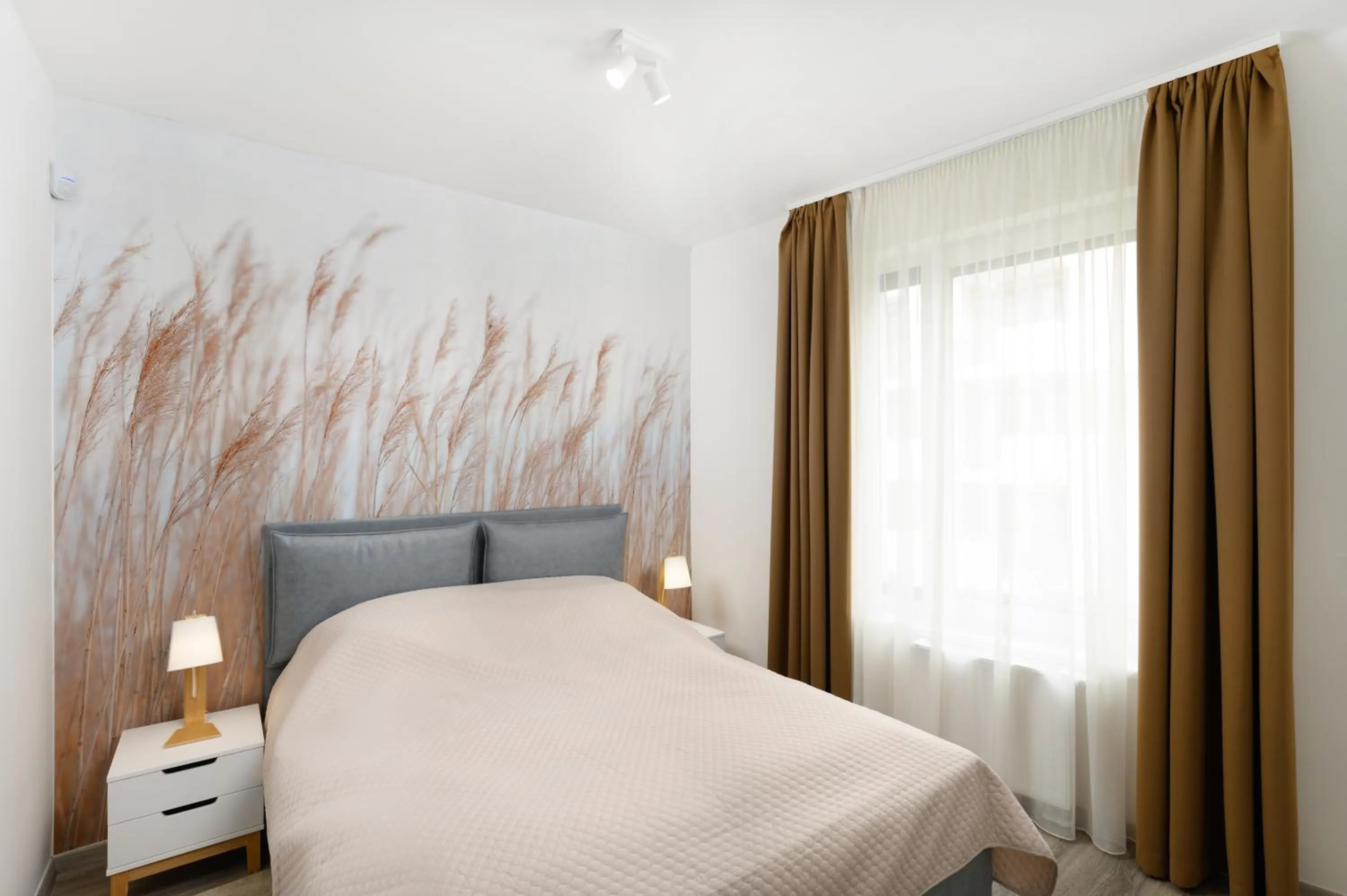 Bed in Elisabeth Downtown Apartments by FirstHost