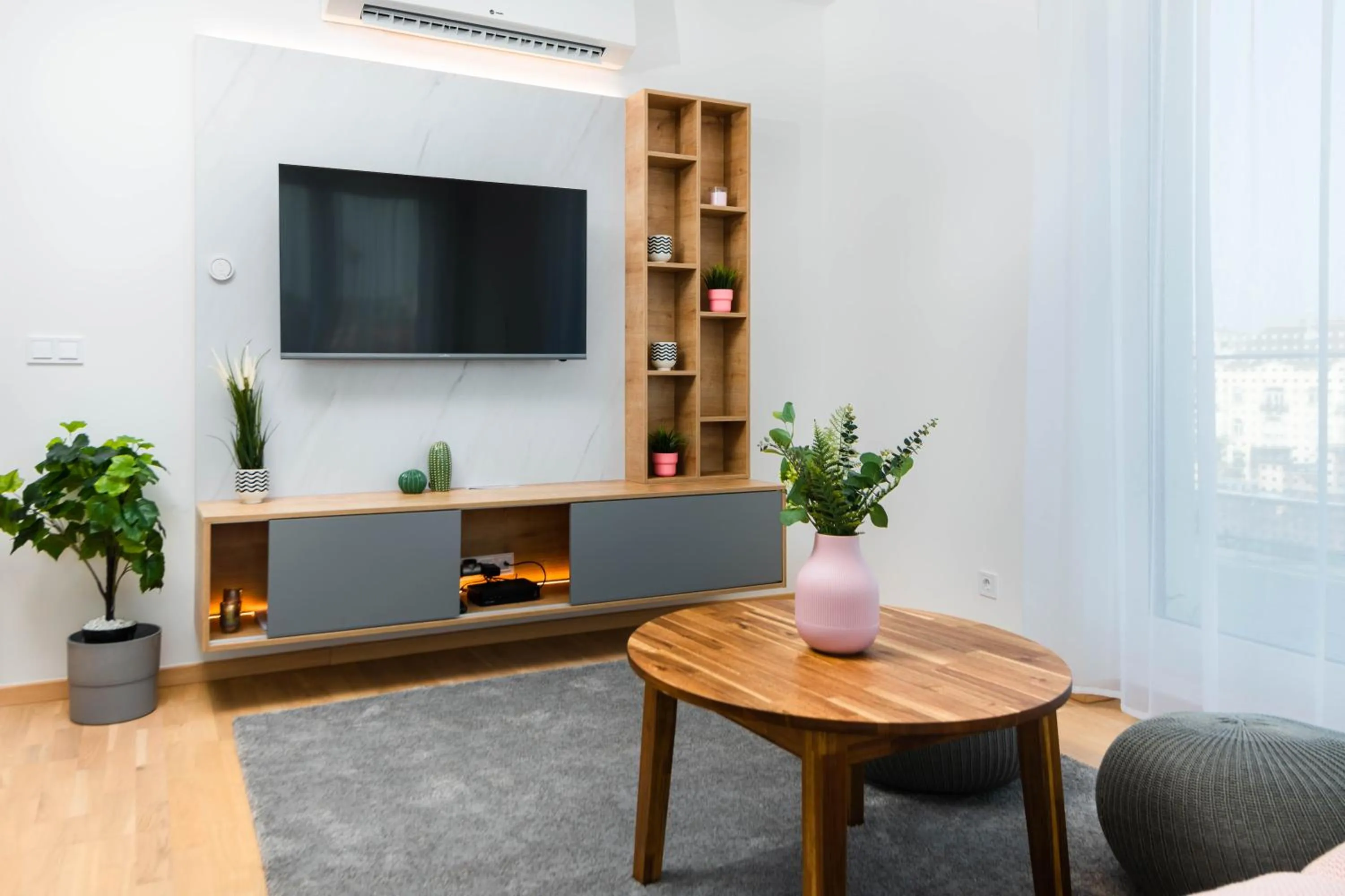 Communal lounge/ TV room in Elisabeth Downtown Apartments by FirstHost