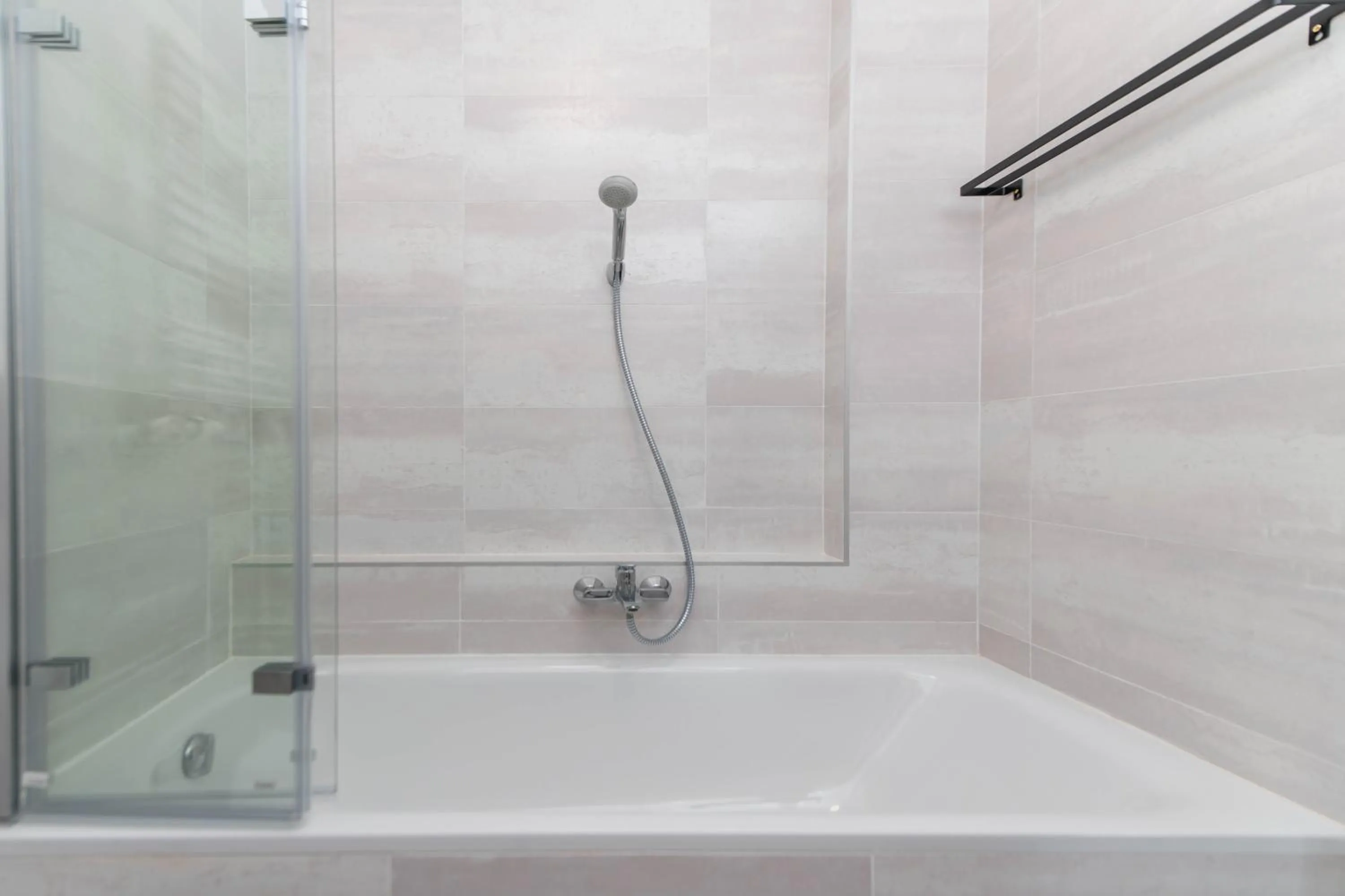 Shower in Elisabeth Downtown Apartments by FirstHost