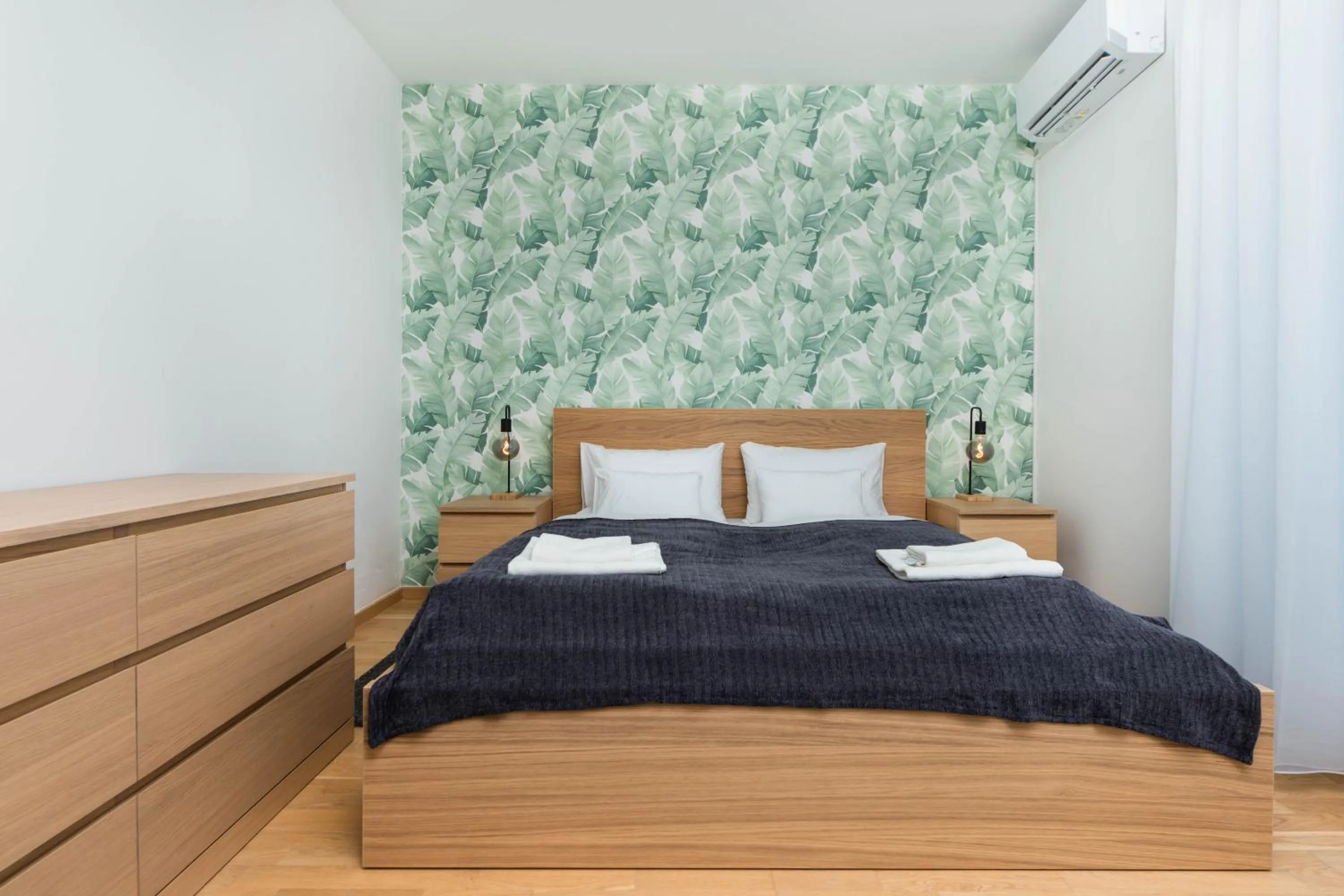 Bed in Elisabeth Downtown Apartments by FirstHost