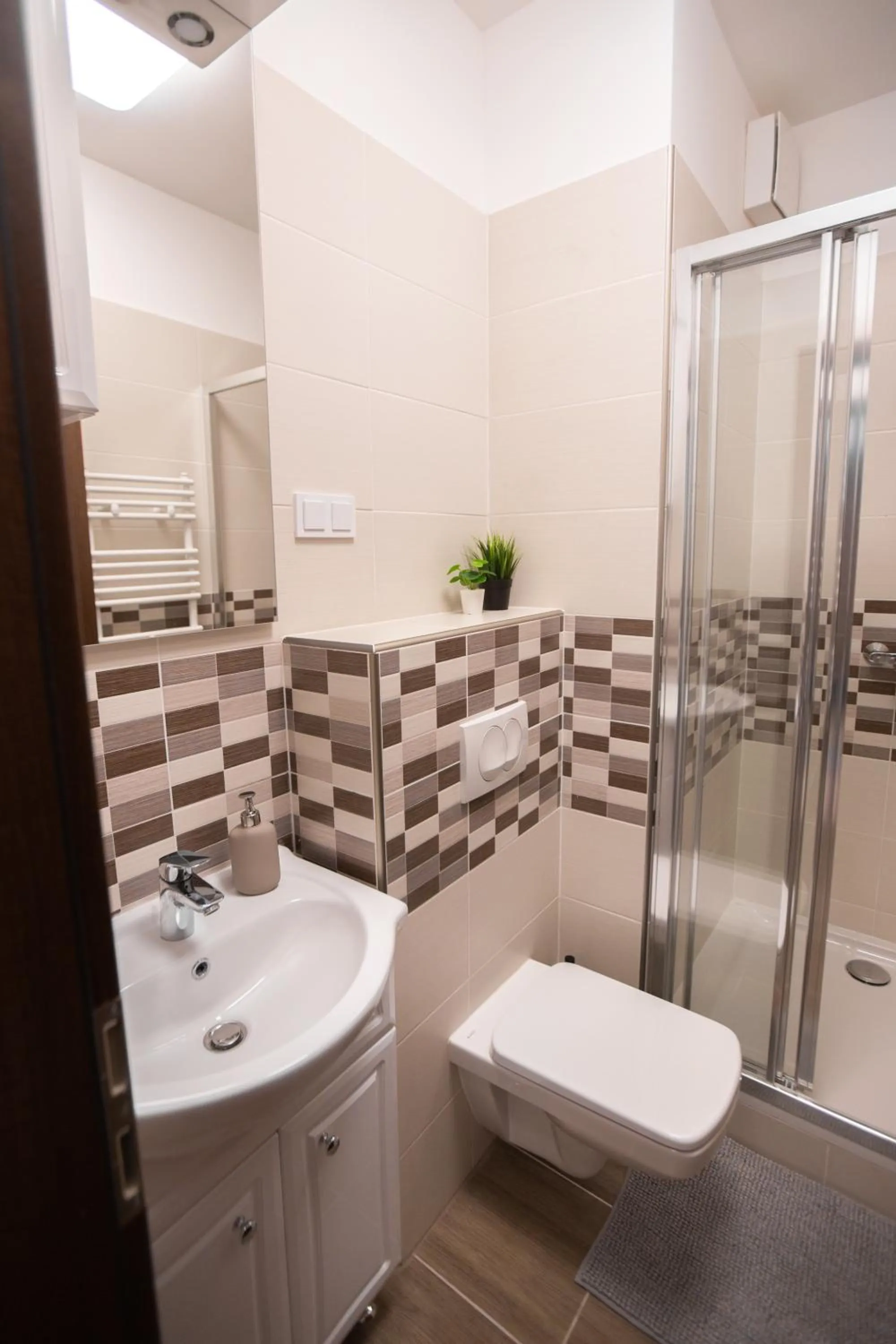 Shower in Elisabeth Downtown Apartments by FirstHost