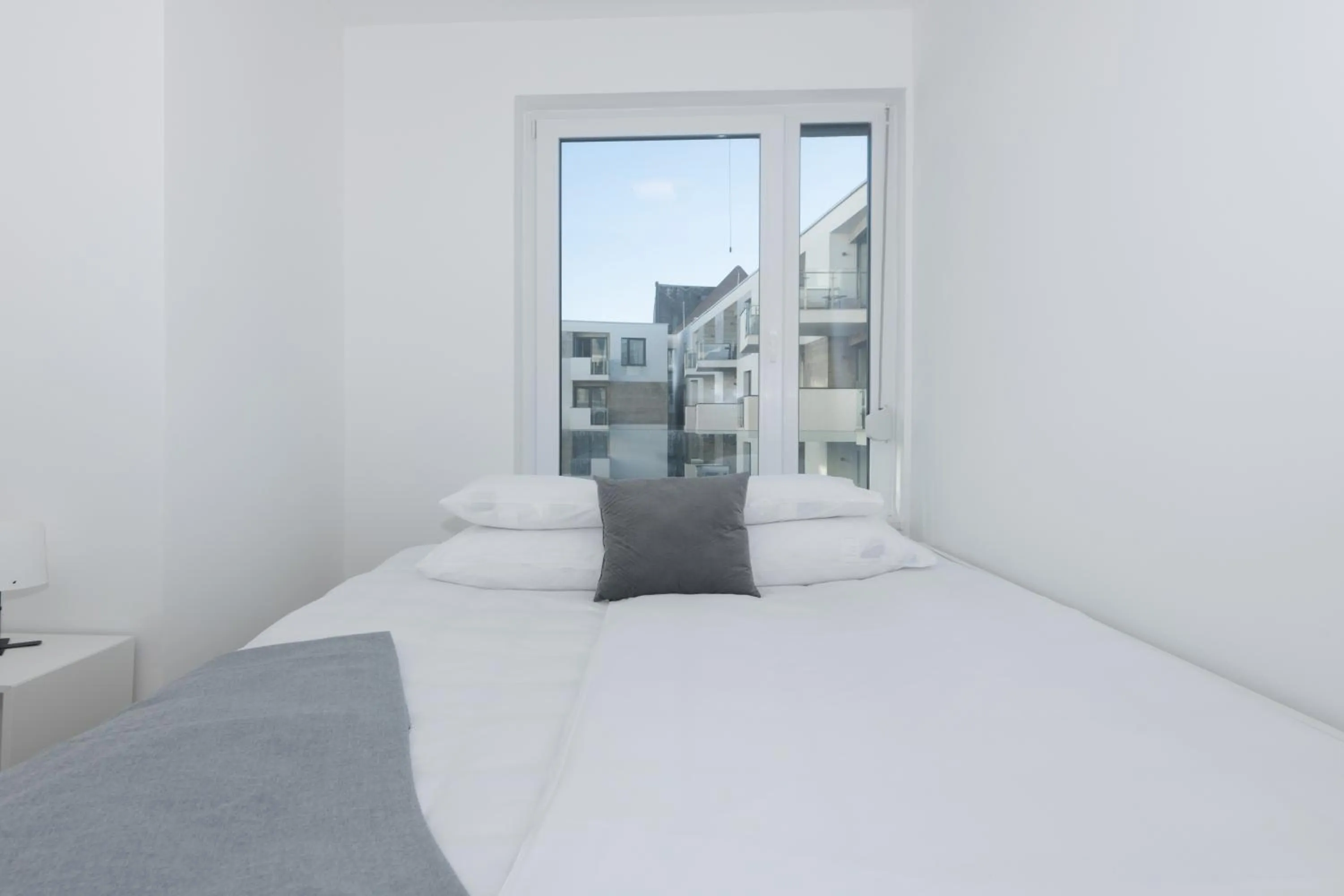 Bed in Elisabeth Downtown Apartments by FirstHost