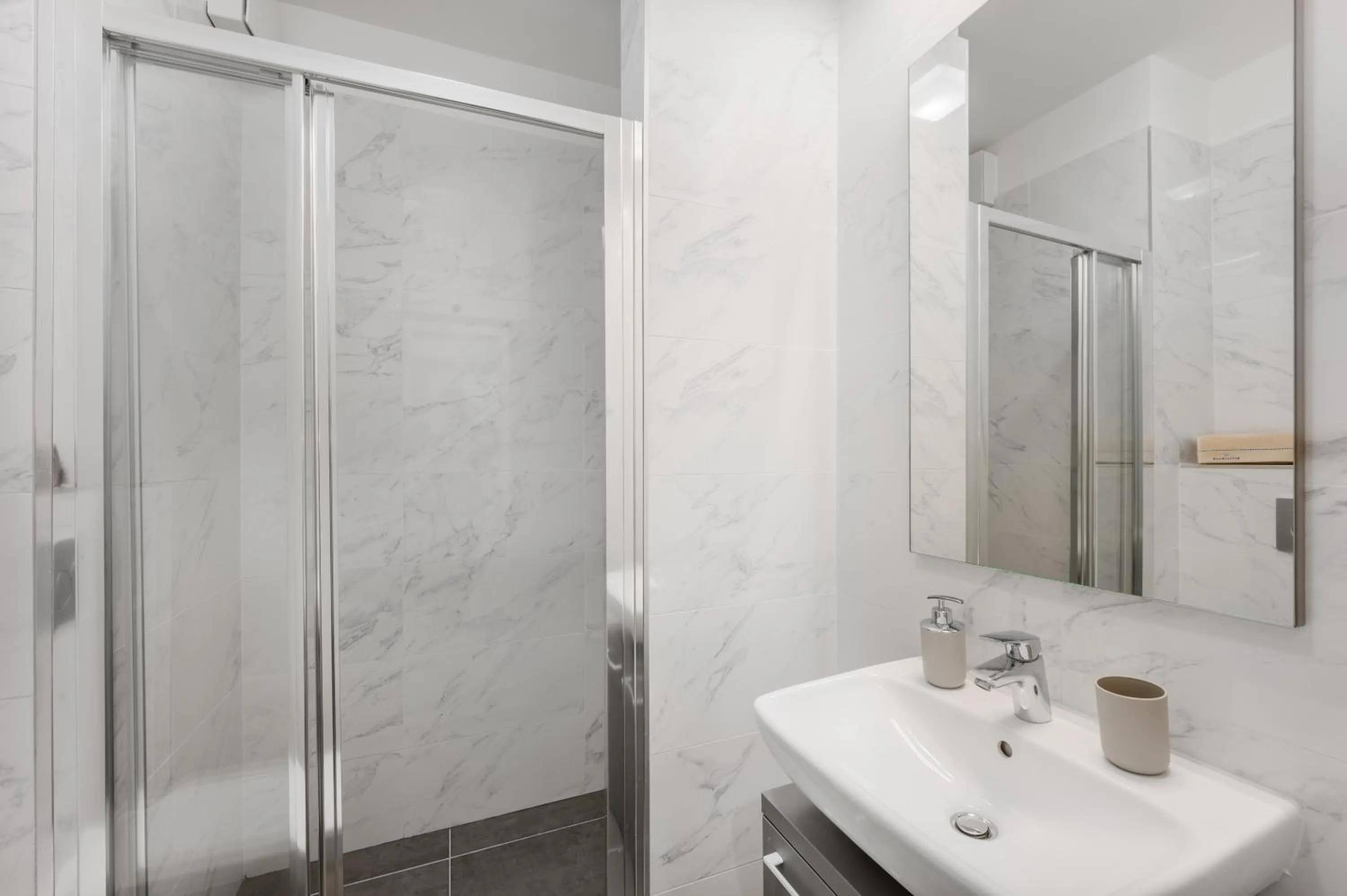 Shower in Elisabeth Downtown Apartments by FirstHost