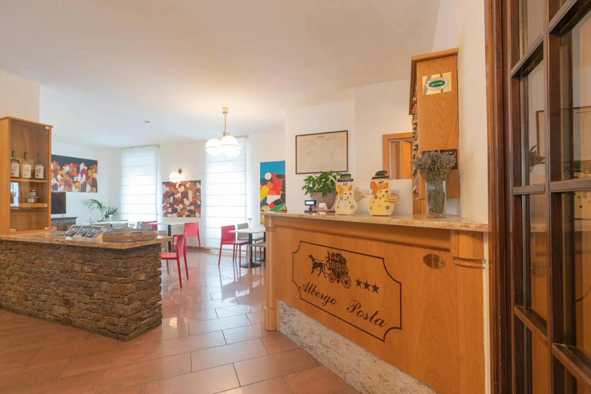 Communal lounge/ TV room in Hotel Posta