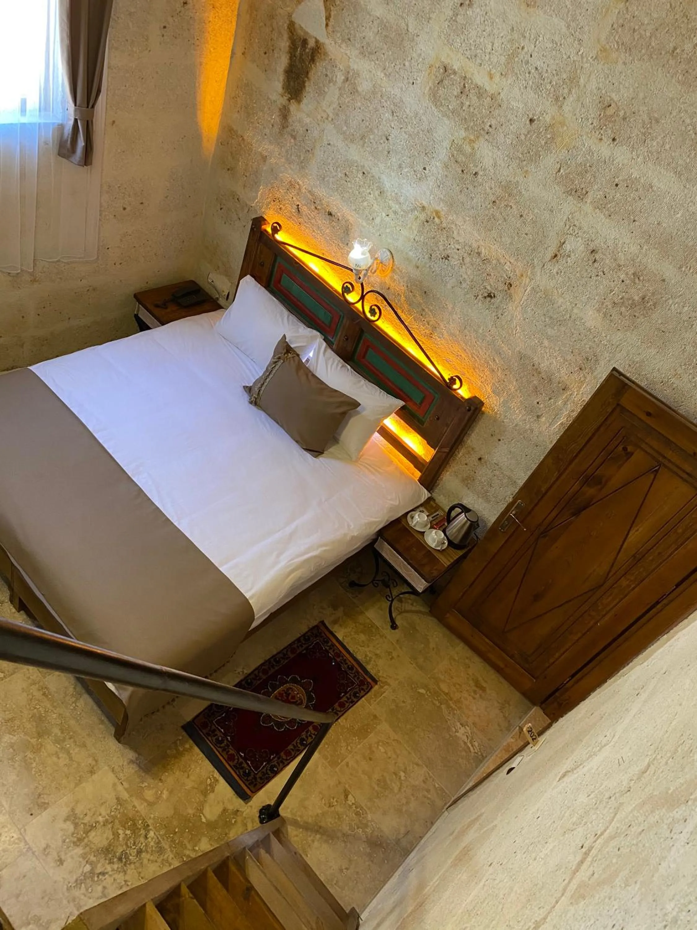 Bed in Zuwinasa House Hotel