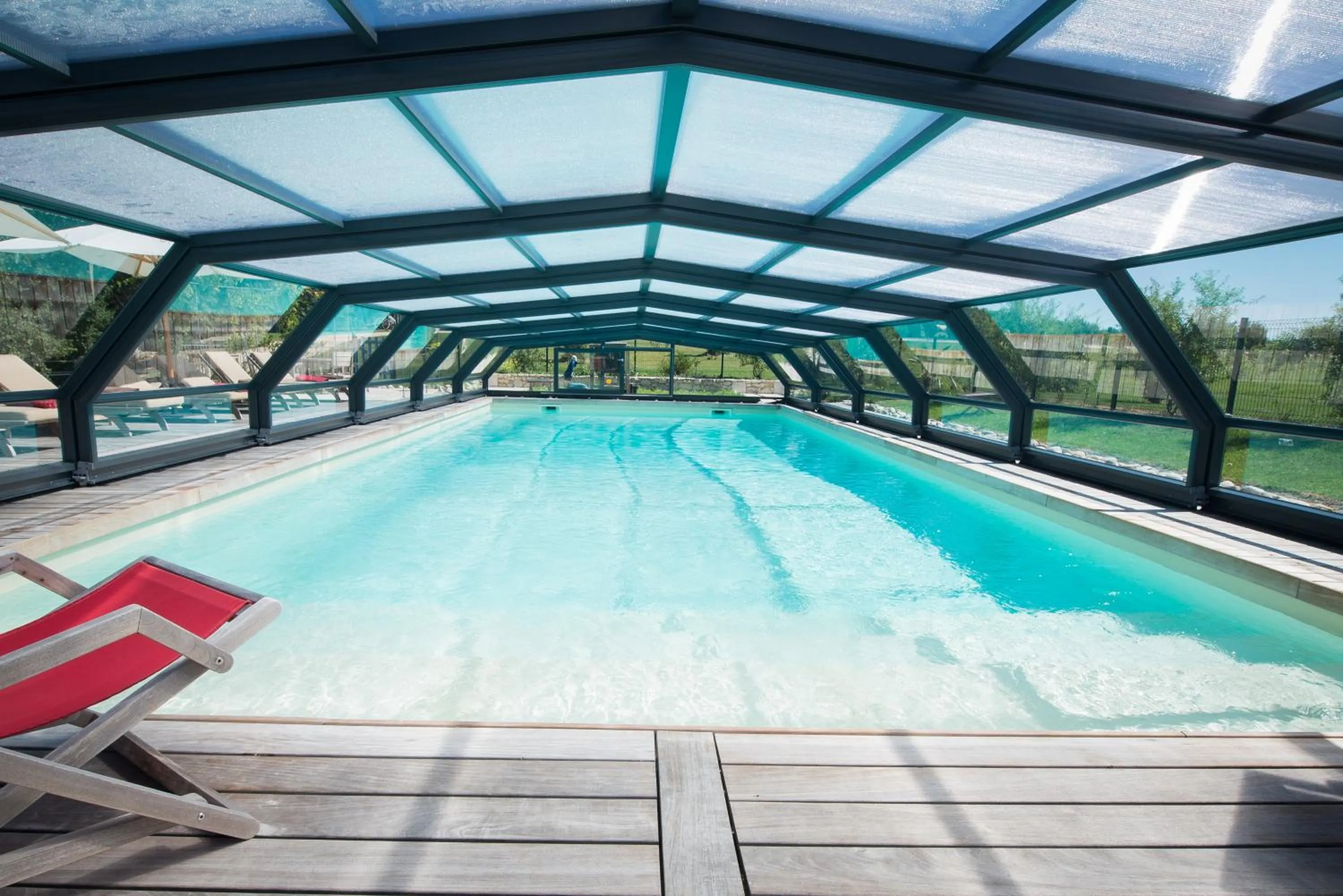 Swimming pool in Chambres d'hôtes Domaine de Nazère