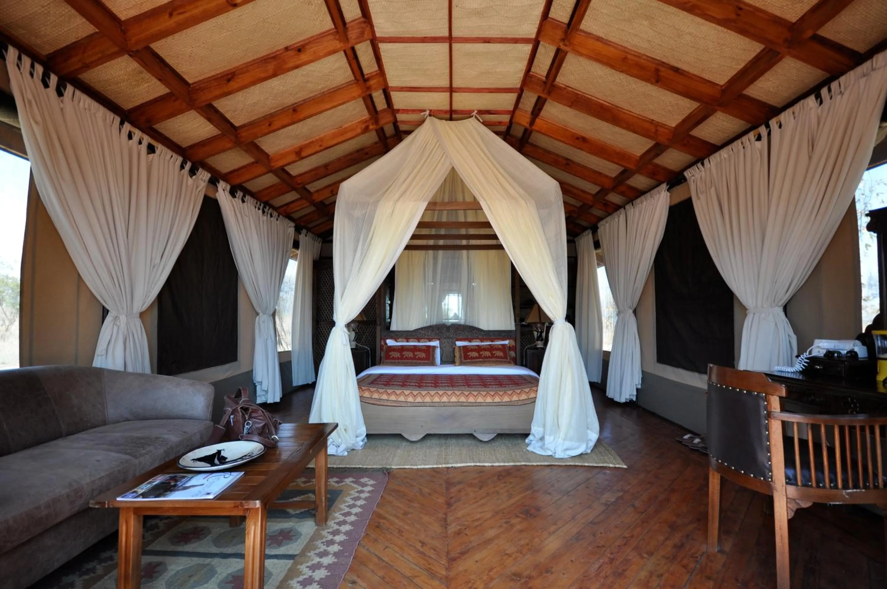 Bed in Elephant Rock Luxury Camp Tarangire