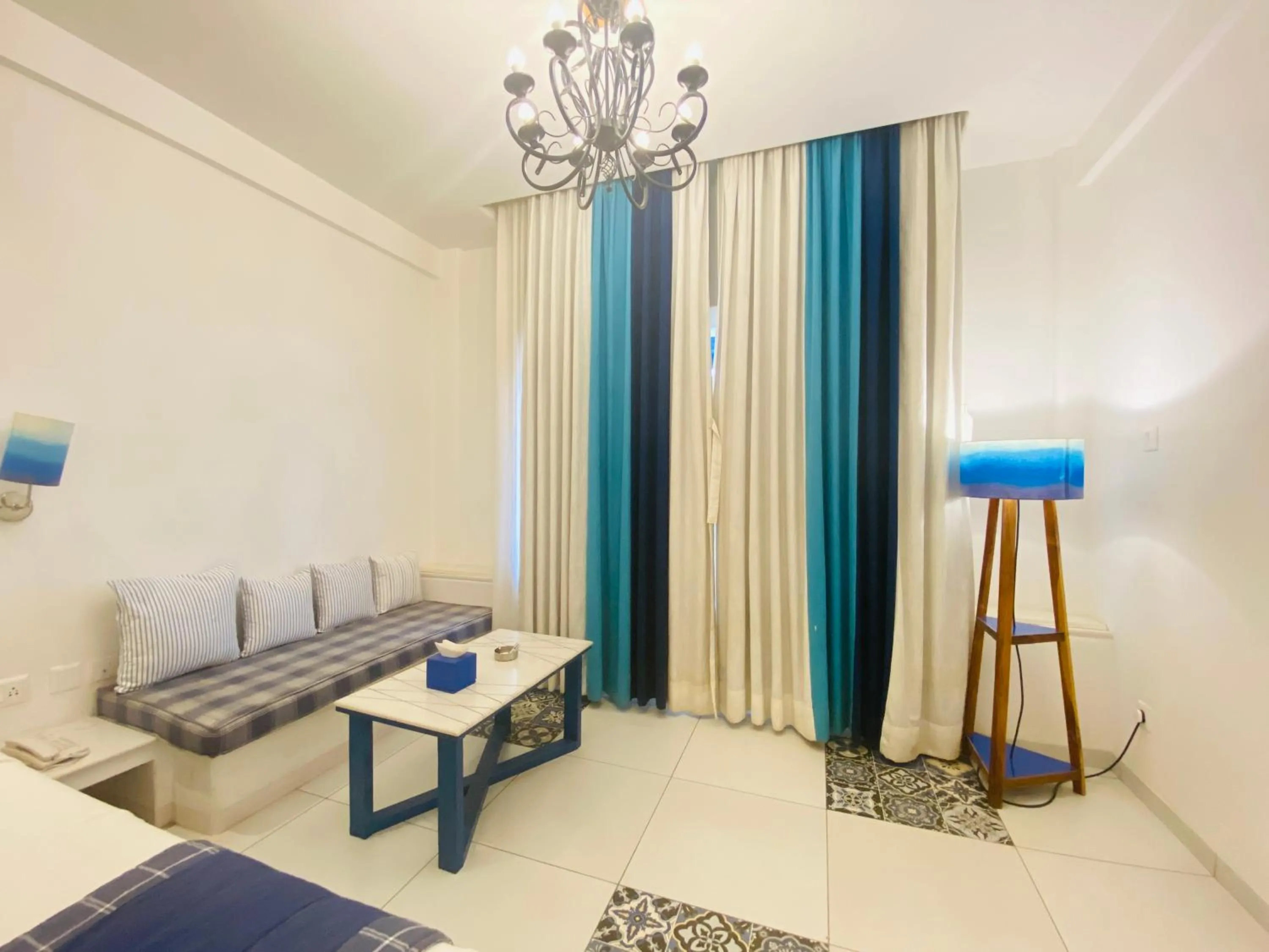 Seating area, Bed in Annaratna Resorts