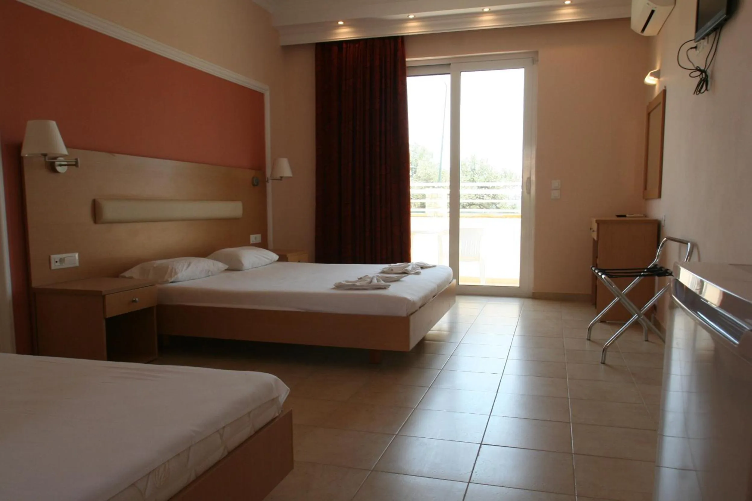 Bed in Diagoras Hotel All Inclusive