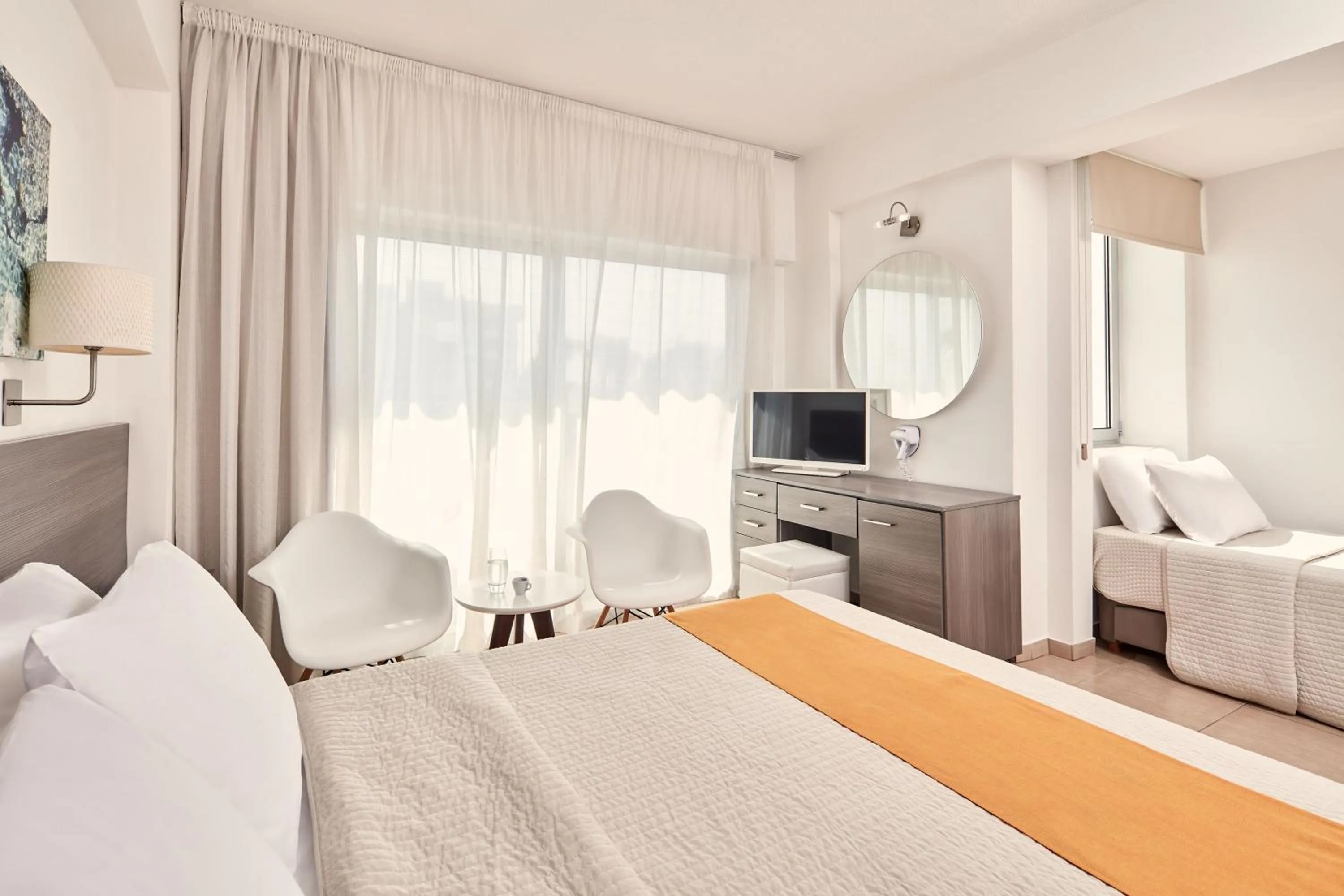 Bed in Atlantica Sancta Napa Hotel