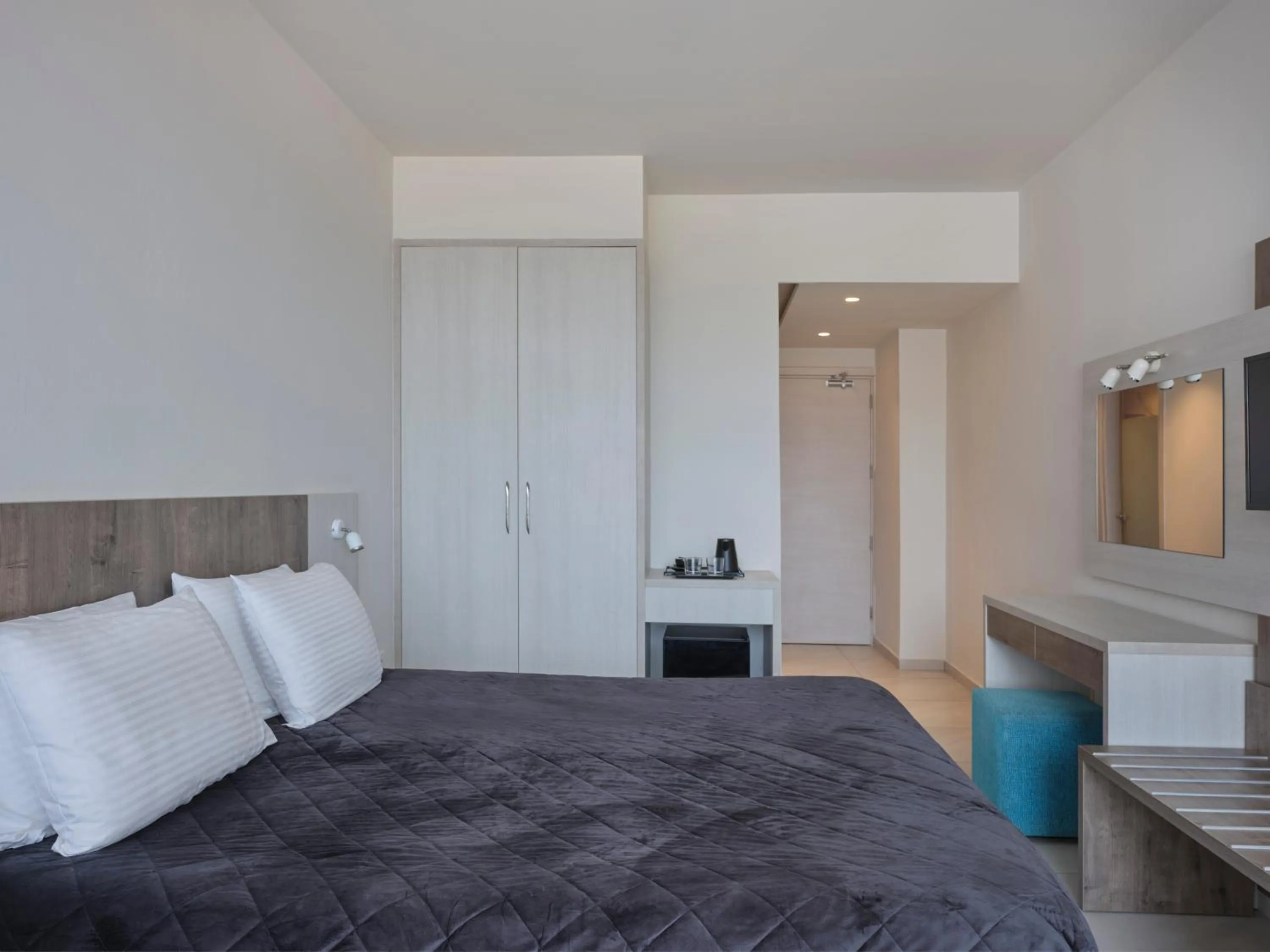 Bed in Atlantica Sancta Napa Hotel