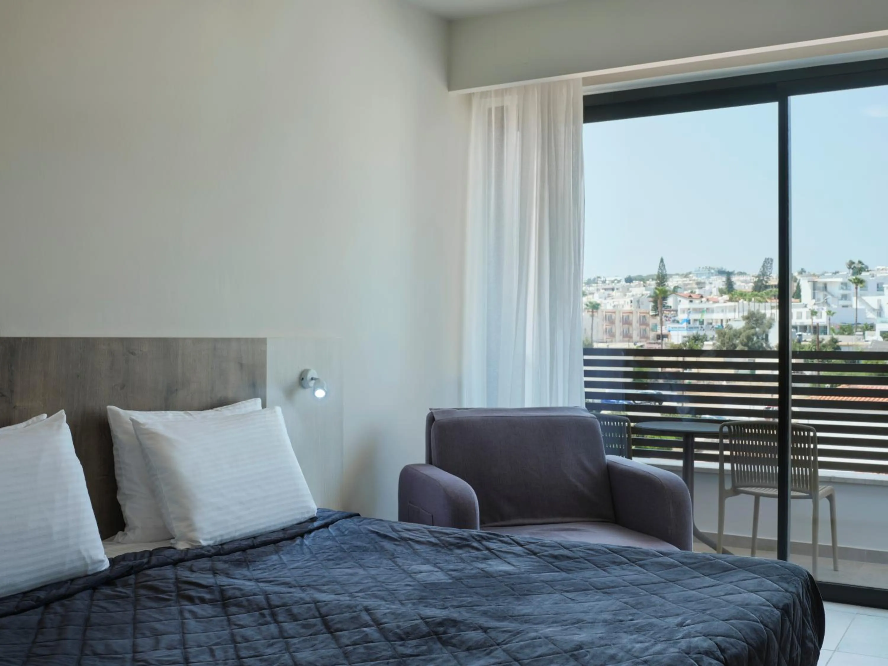 Bed in Atlantica Sancta Napa Hotel