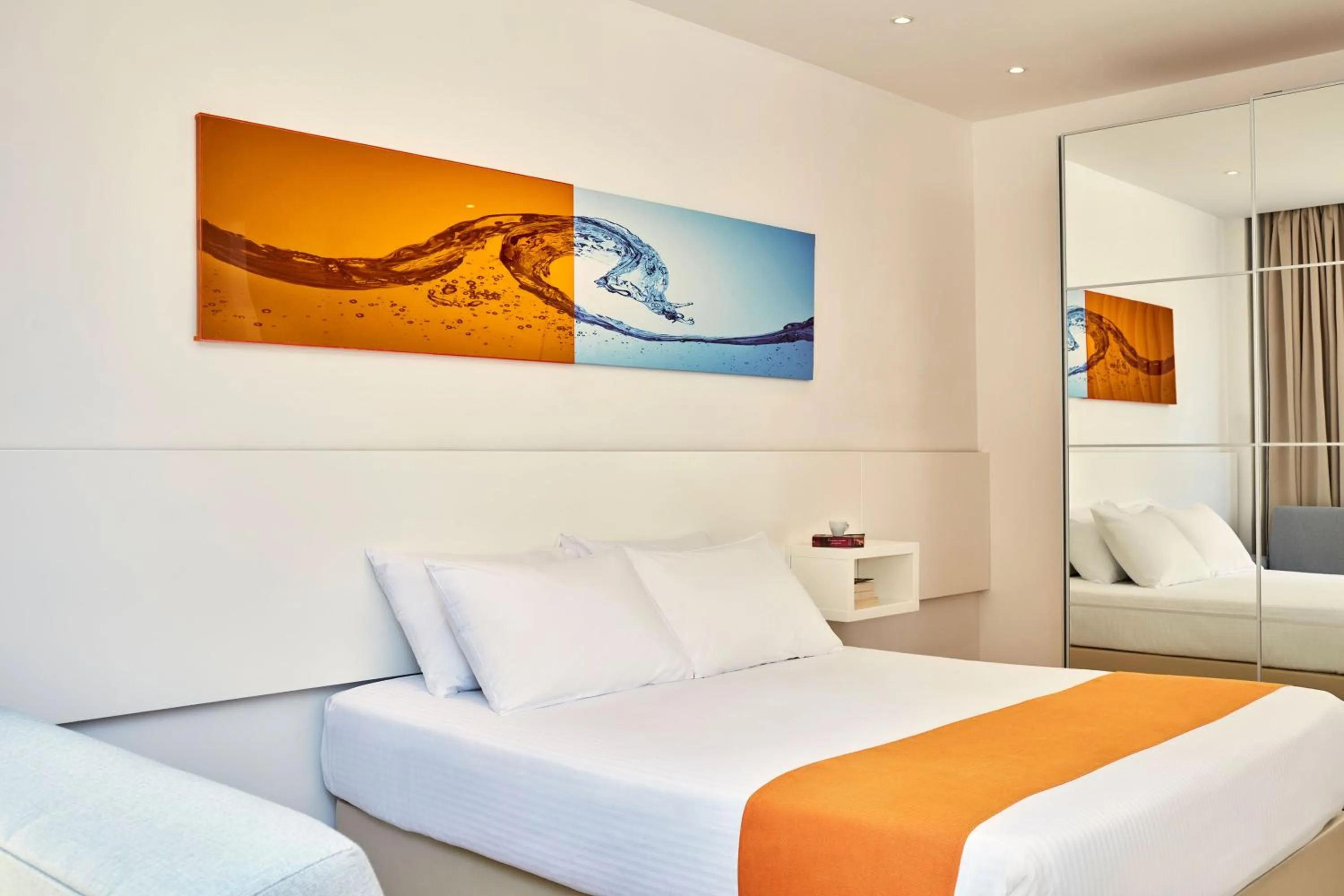 Bed in Atlantica Sancta Napa Hotel