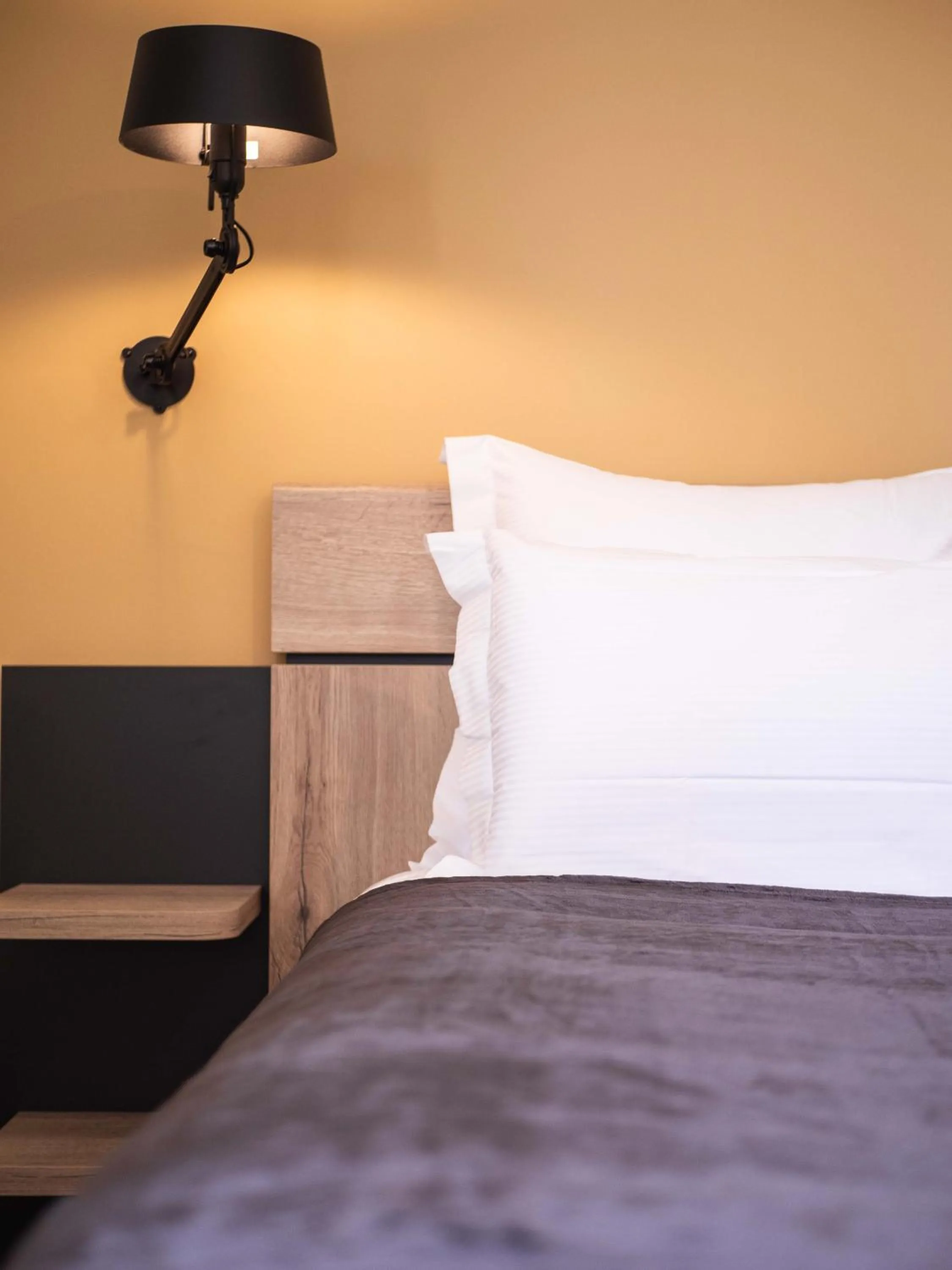 Bed in Logis hôtels Le Saint Pierre