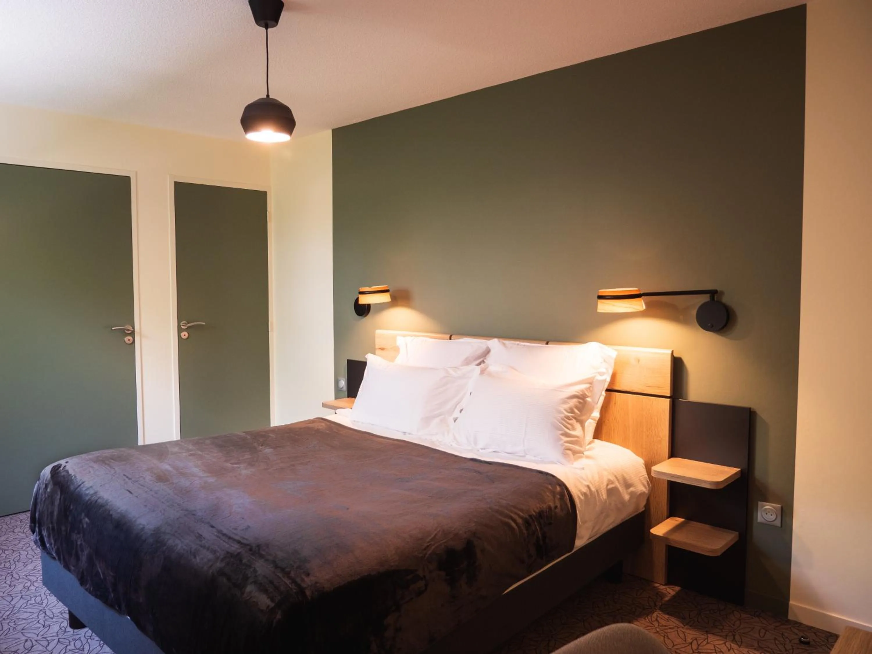 Bedroom, Bed in Logis hôtels Le Saint Pierre