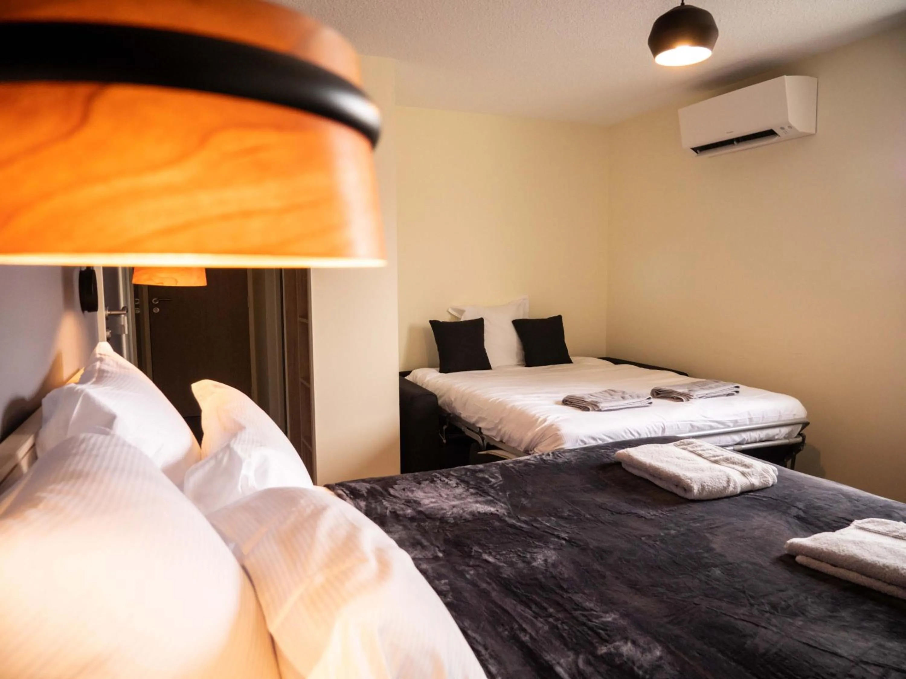 Bed in Logis hôtels Le Saint Pierre