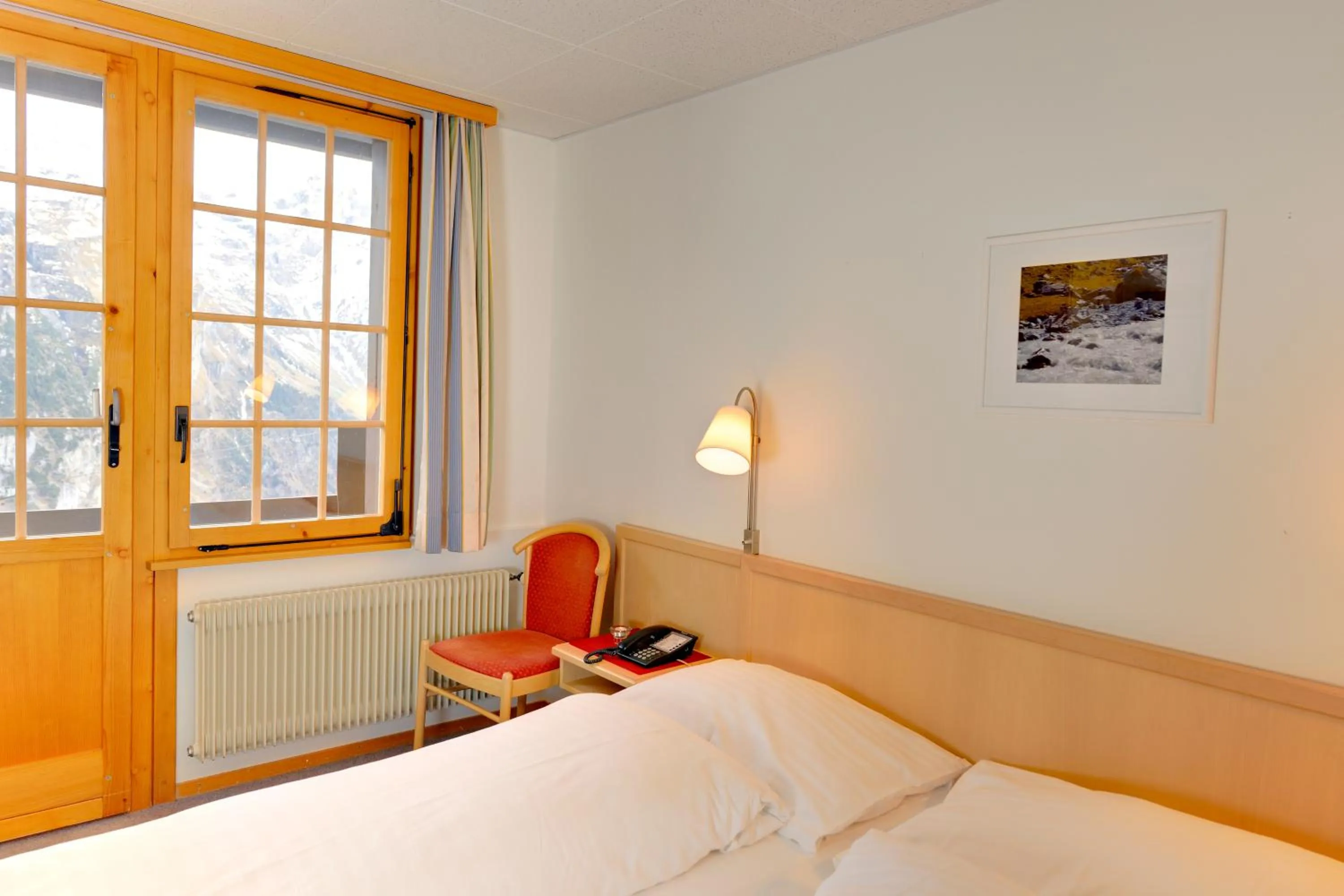 Bed in Hotel Alpenruh