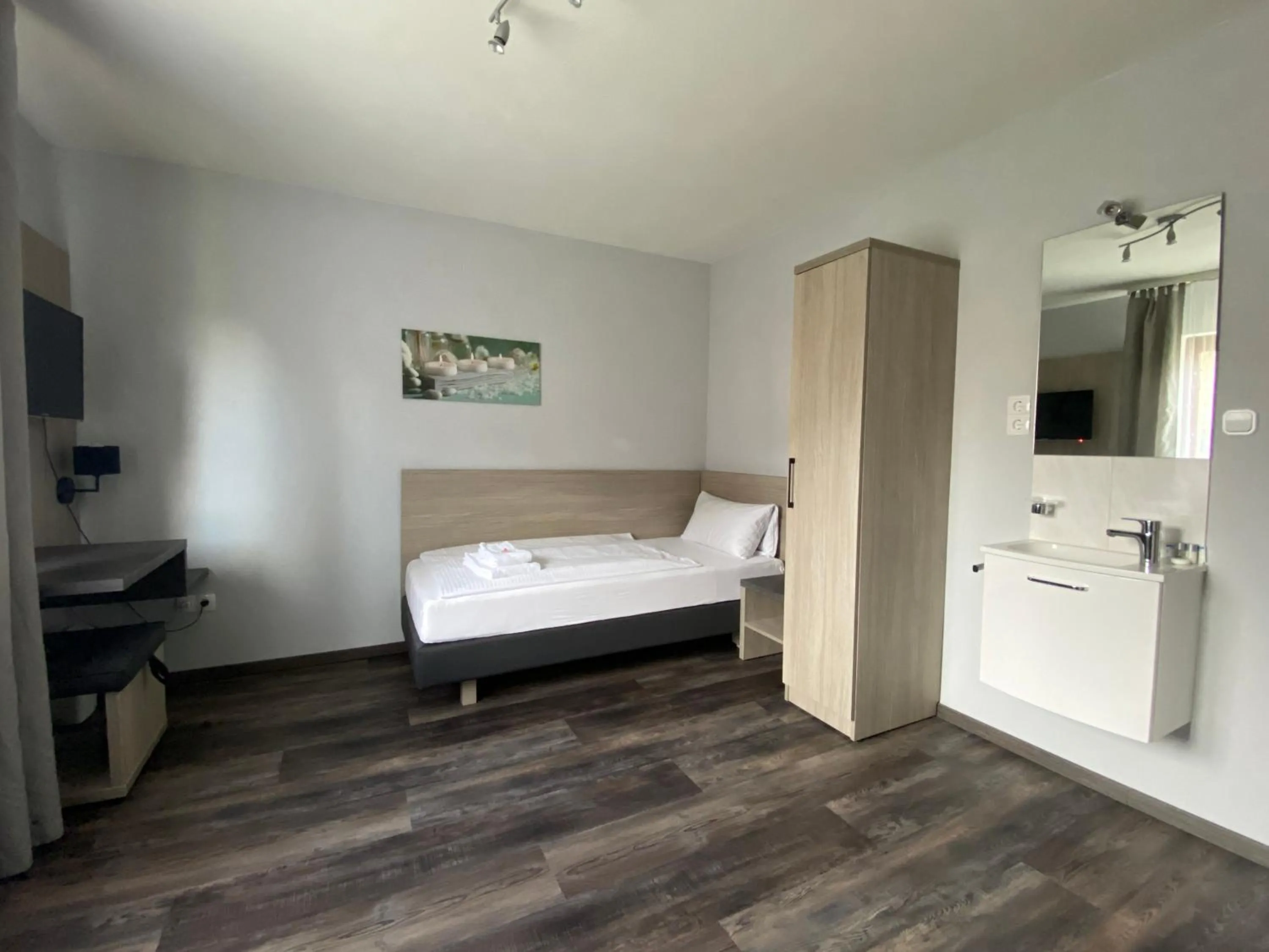 Photo of the whole room, Bed in Landgasthof-Bikerhotel Arnold