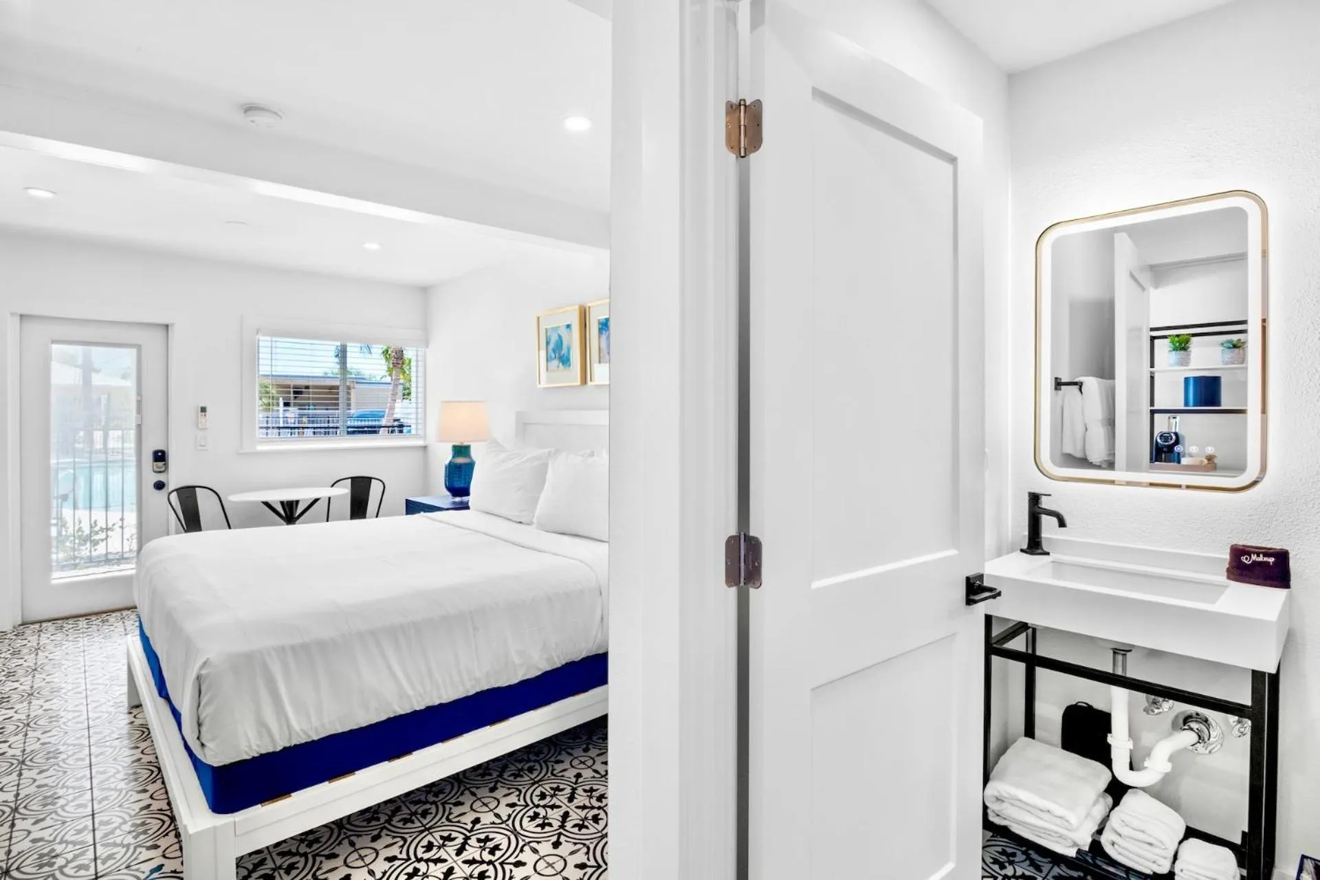 Bed in Pelican Post at Anna Maria Island Inn