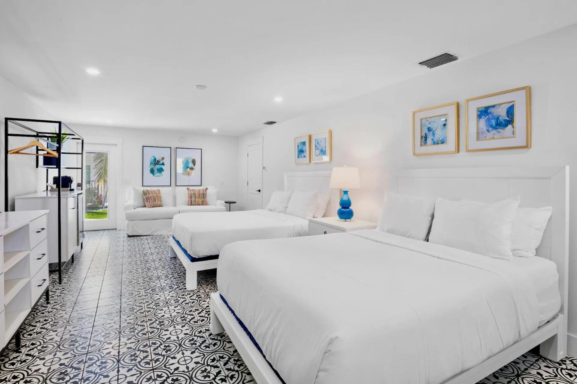 Bed in Pelican Post at Anna Maria Island Inn