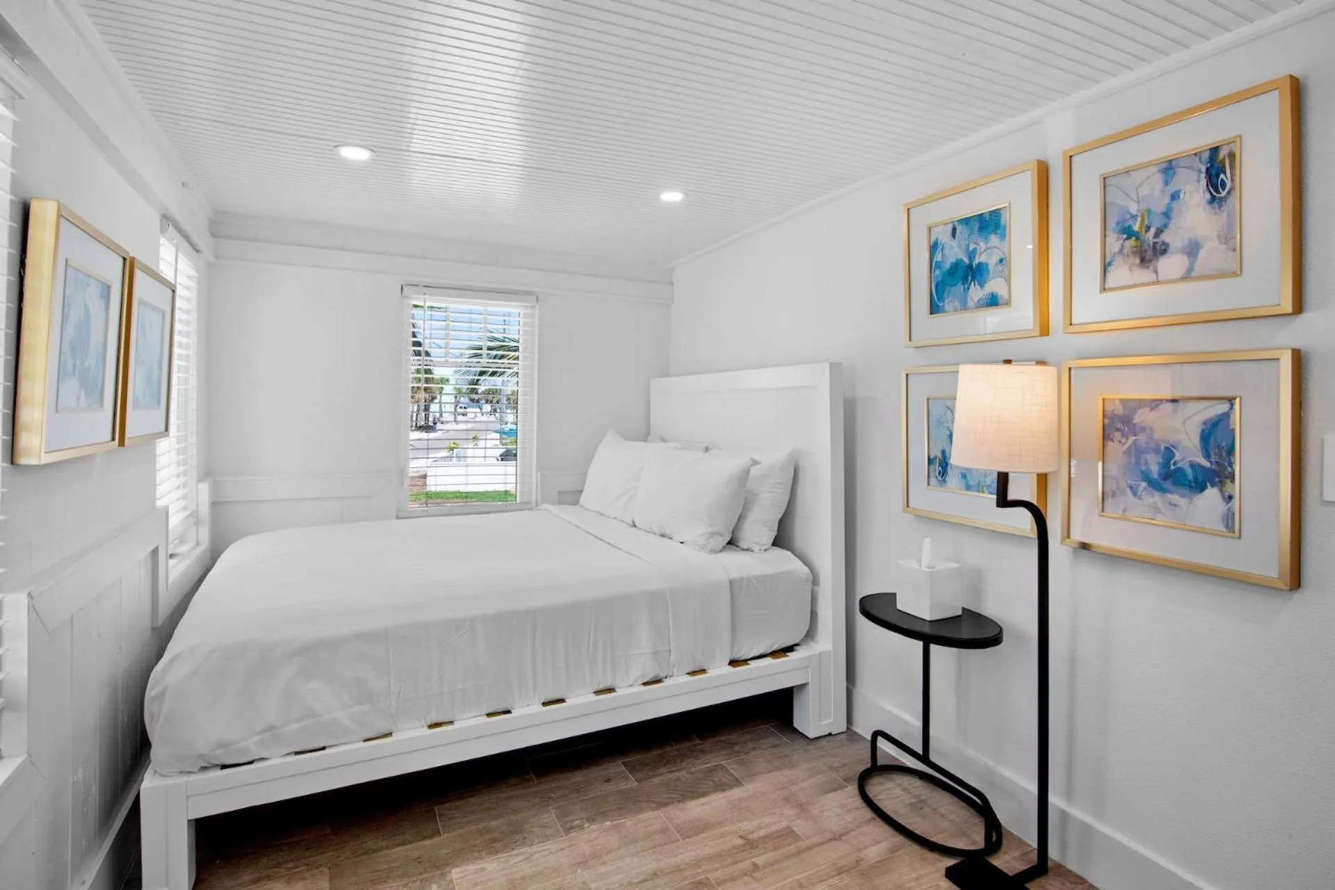 Bed in Pelican Post at Anna Maria Island Inn