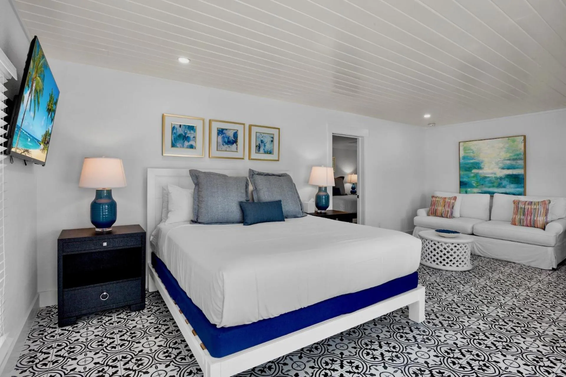 Bed in Pelican Post at Anna Maria Island Inn