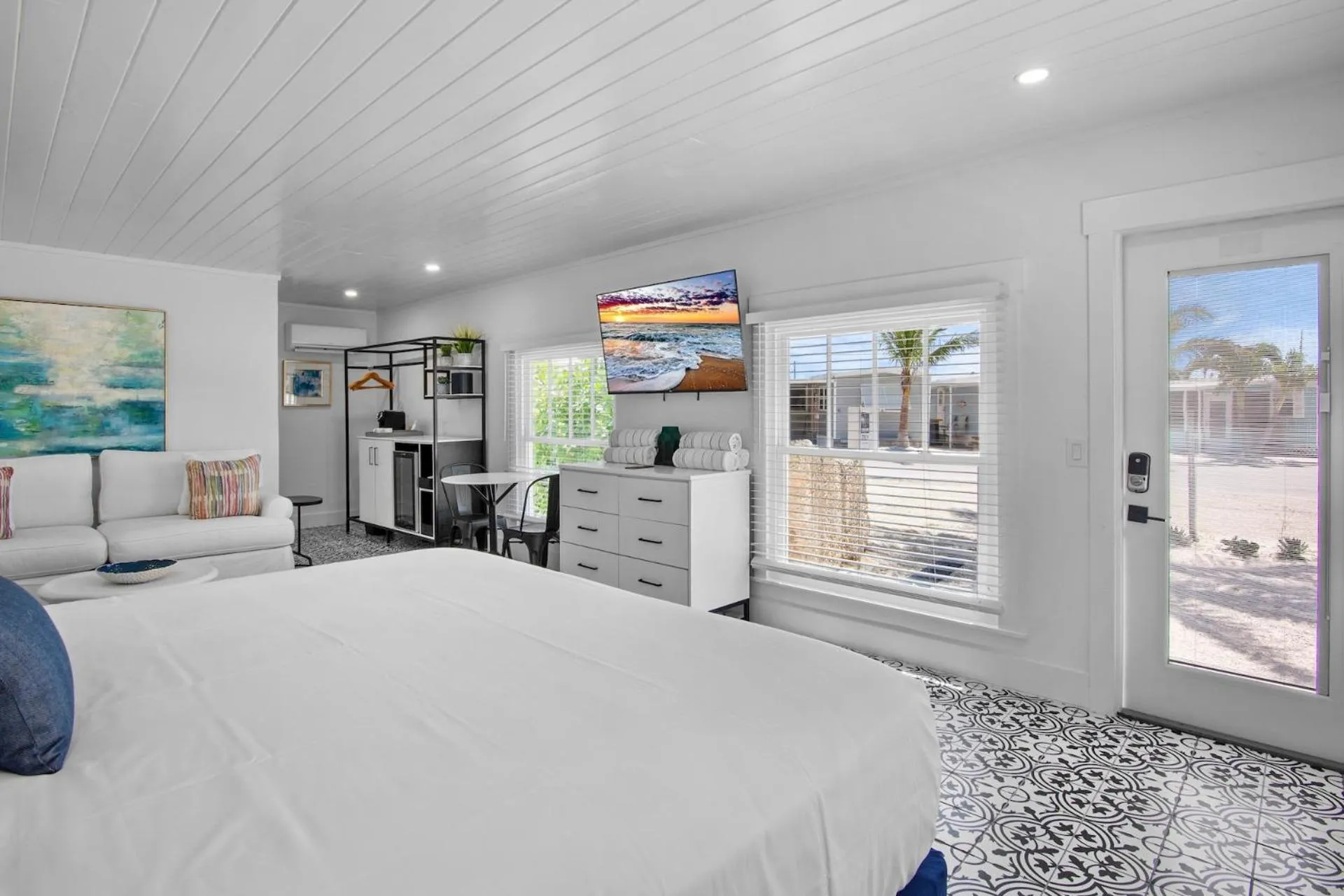 Bed in Pelican Post at Anna Maria Island Inn