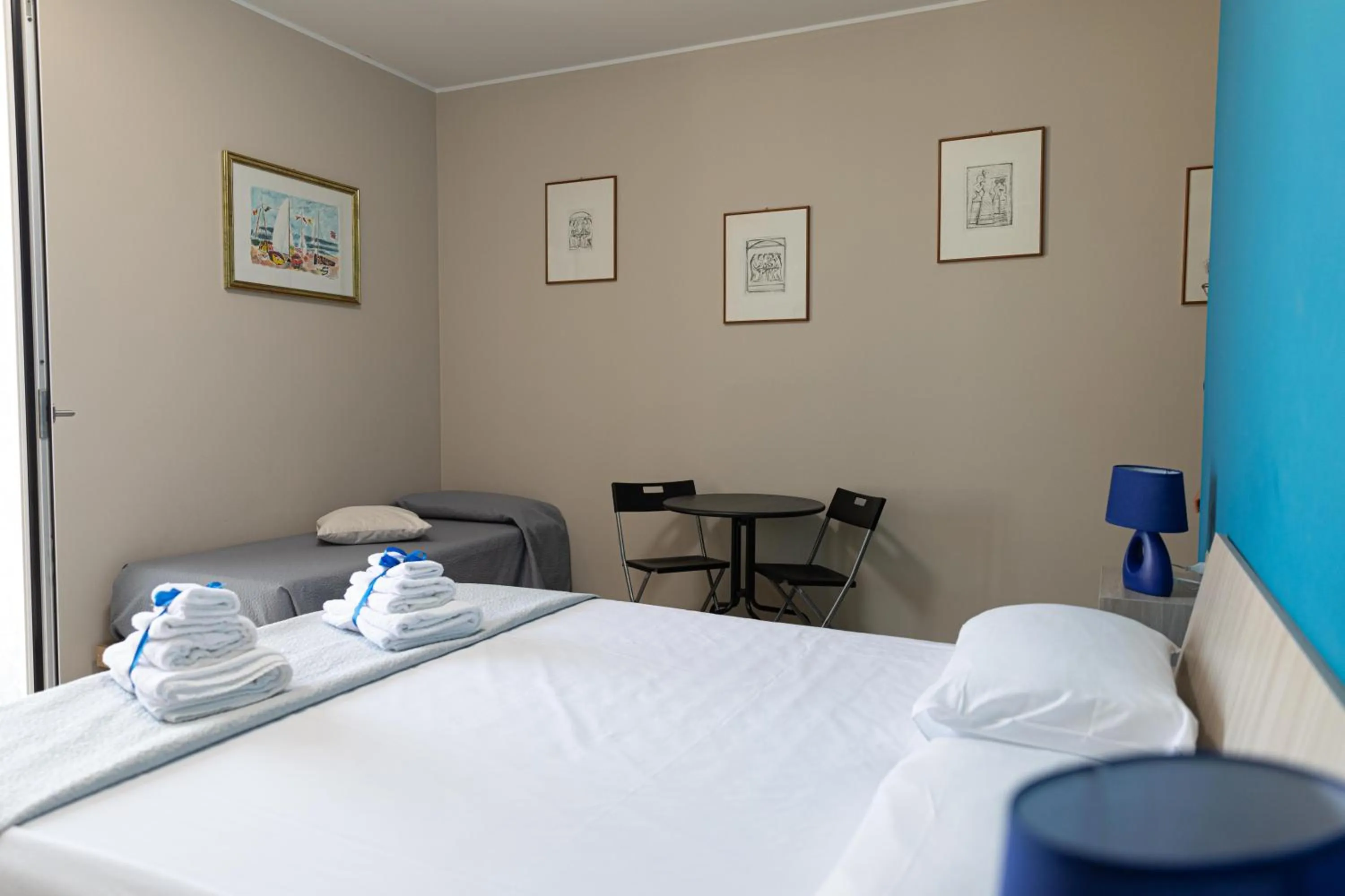 Bed in 16TH FAD ROOMS