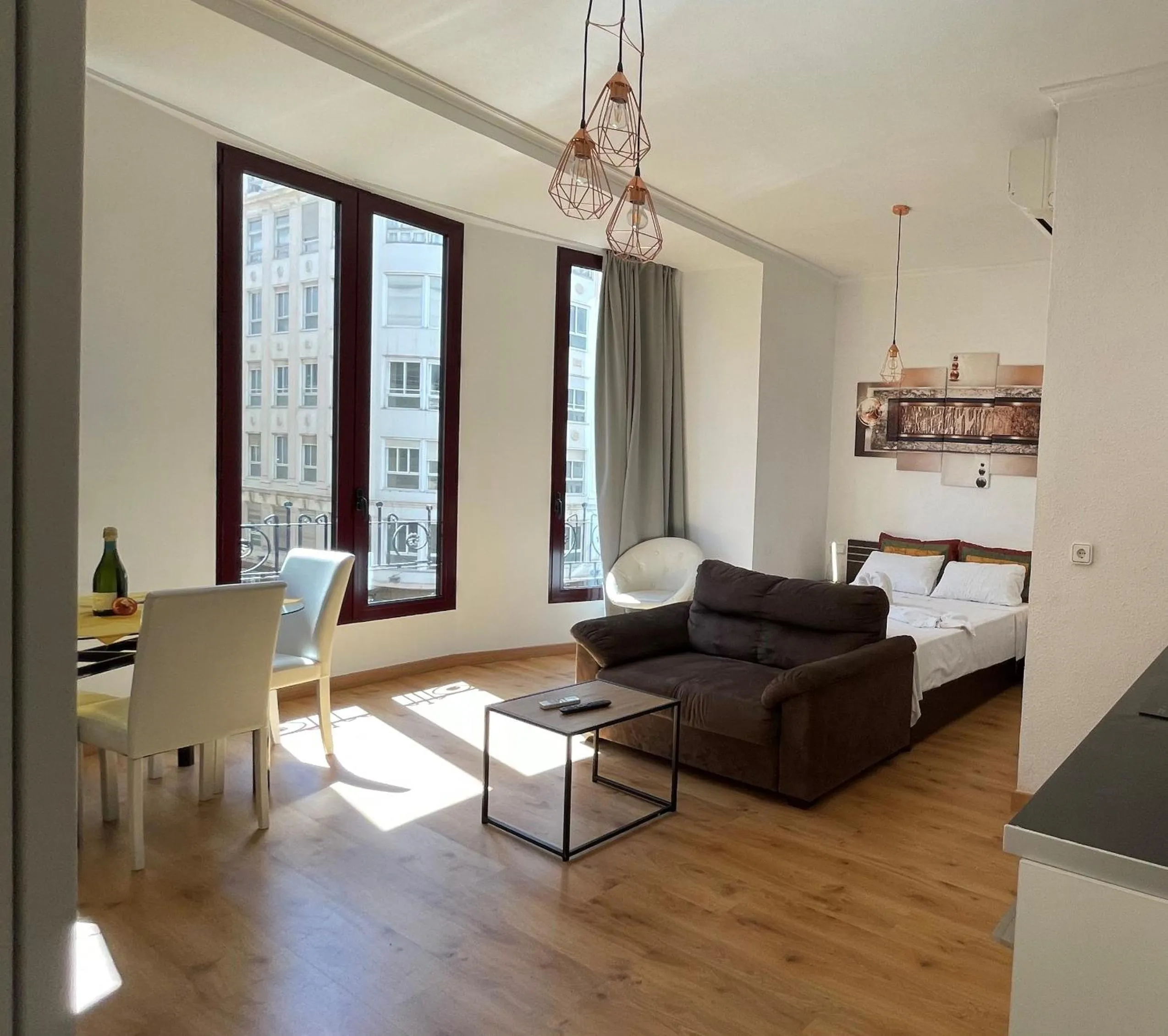 Living room, Bed in Apartamentos Boni