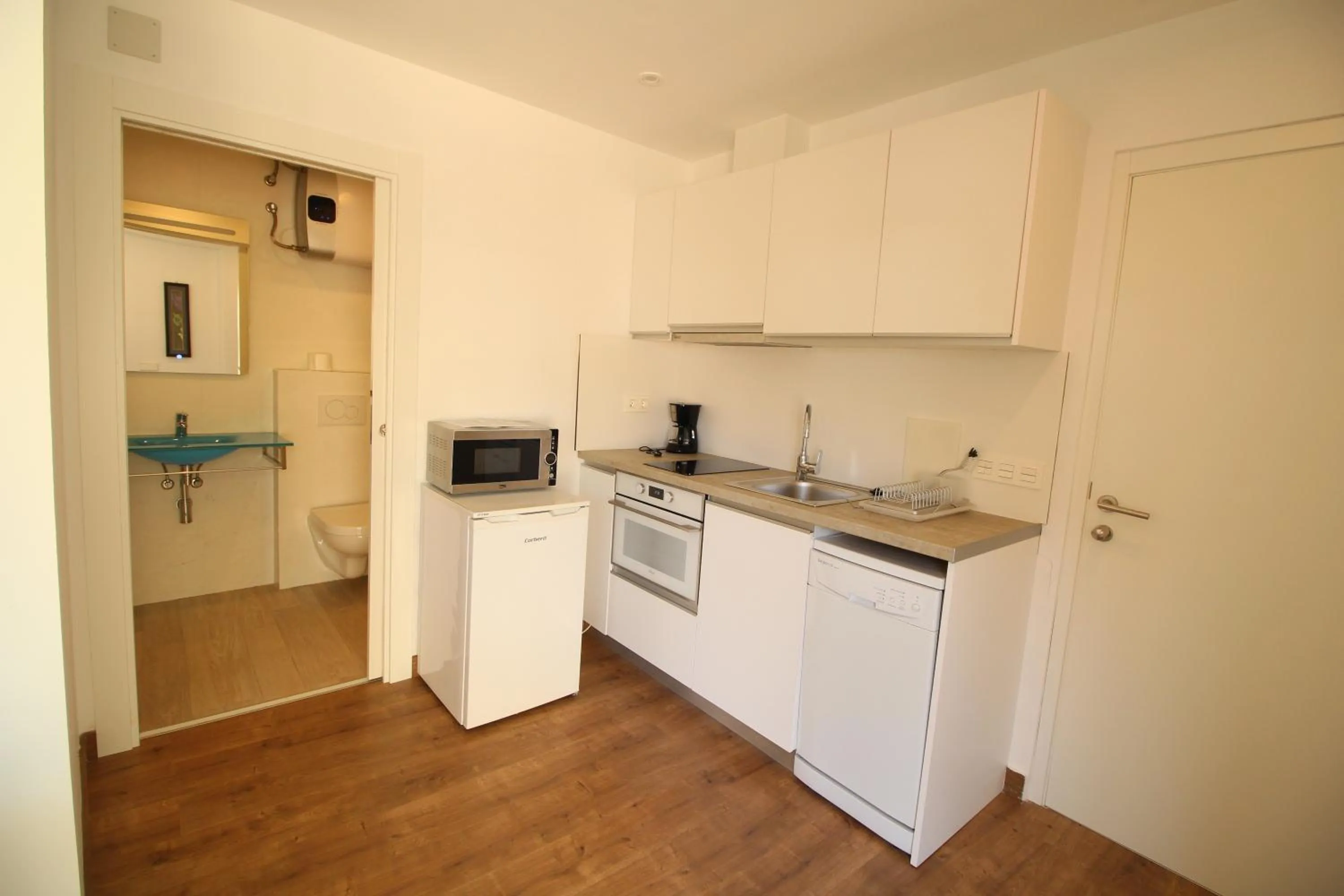 Kitchen or kitchenette in Apartamentos Boni