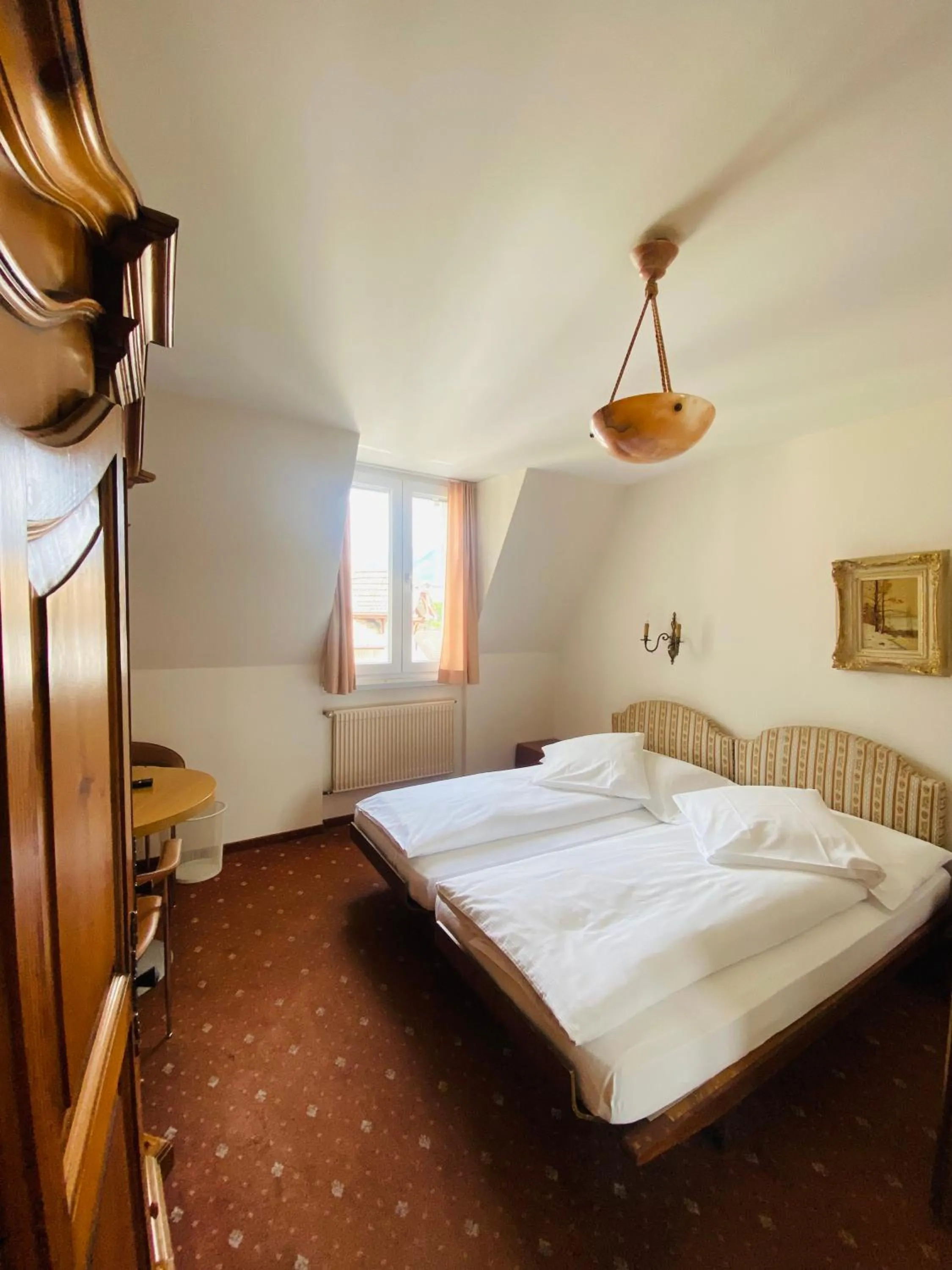 Bed in Hotel De La Paix