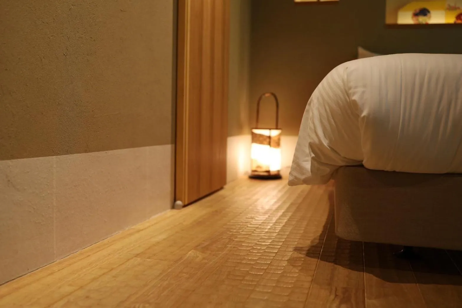 Bed in Hotel Rakurakuan