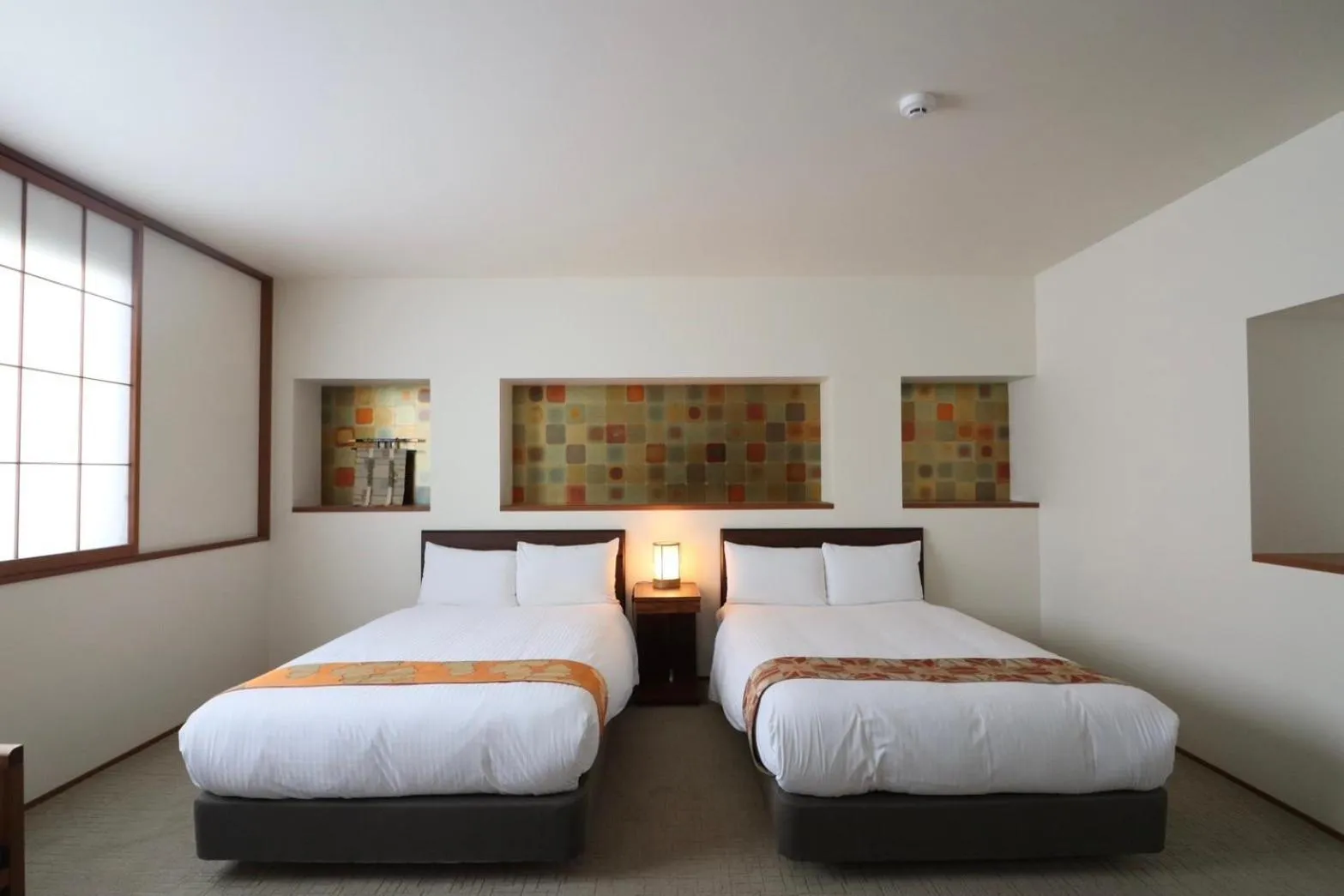 Bed in Hotel Rakurakuan