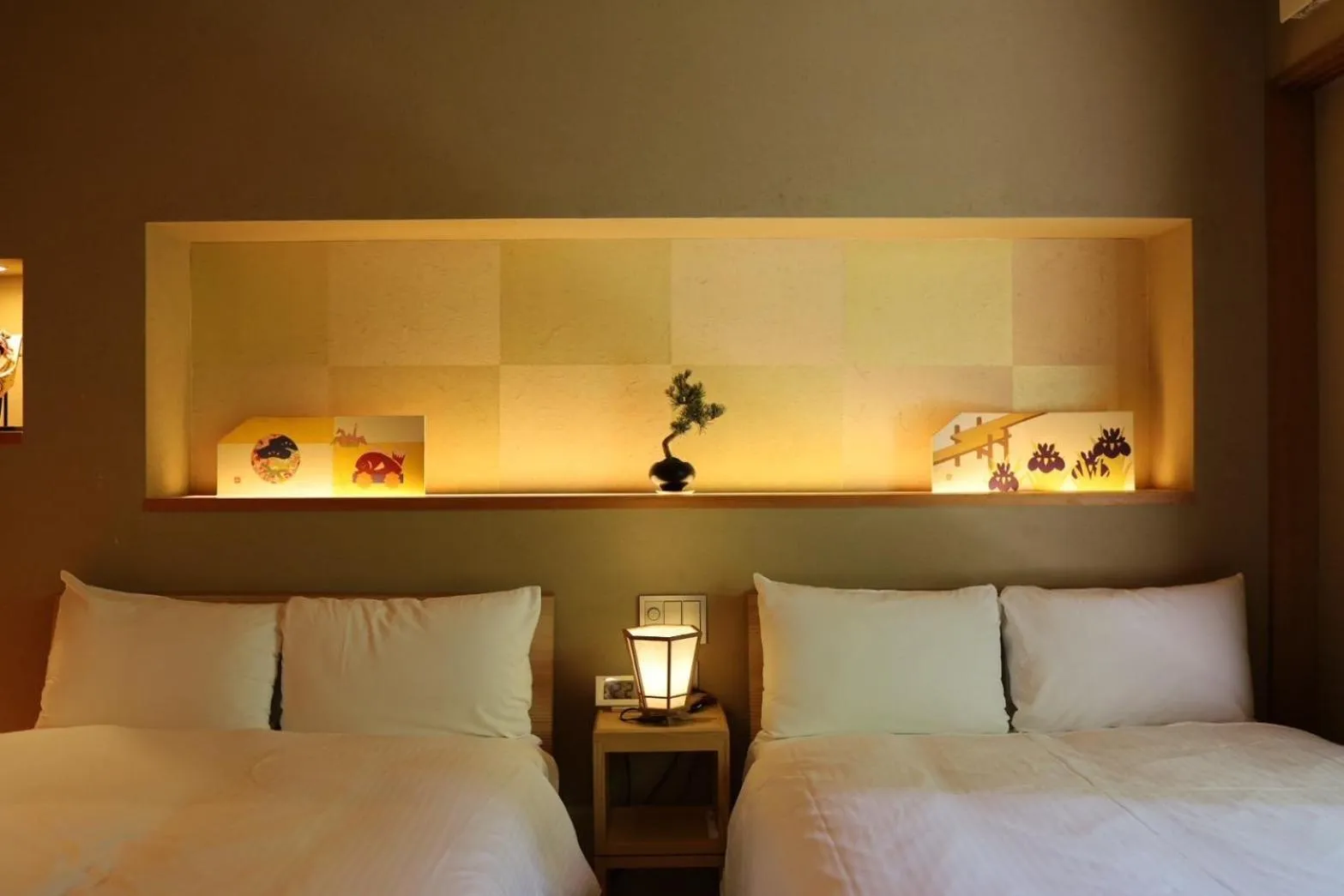 Bed in Hotel Rakurakuan