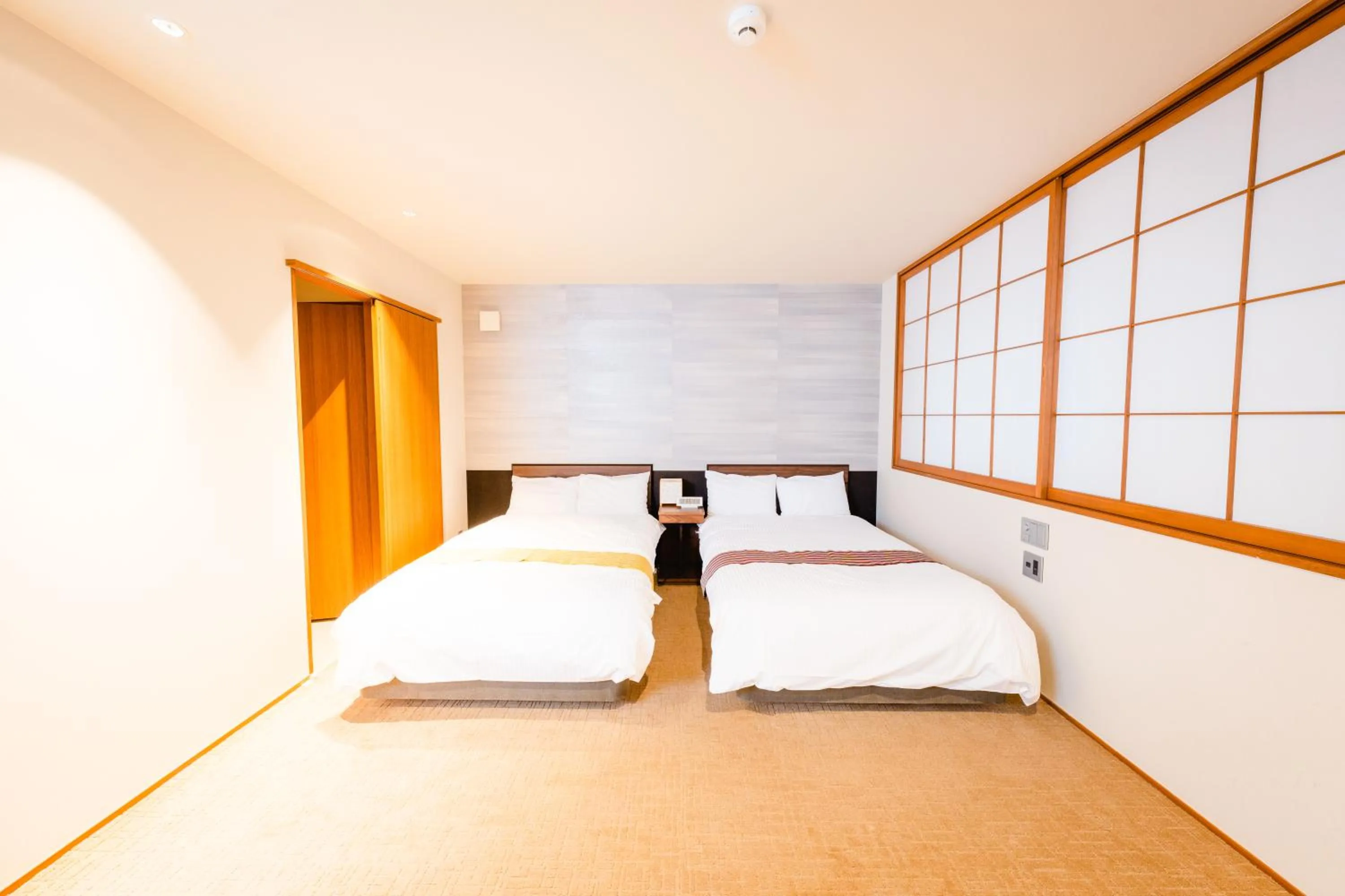 Bed in Hotel Rakurakuan