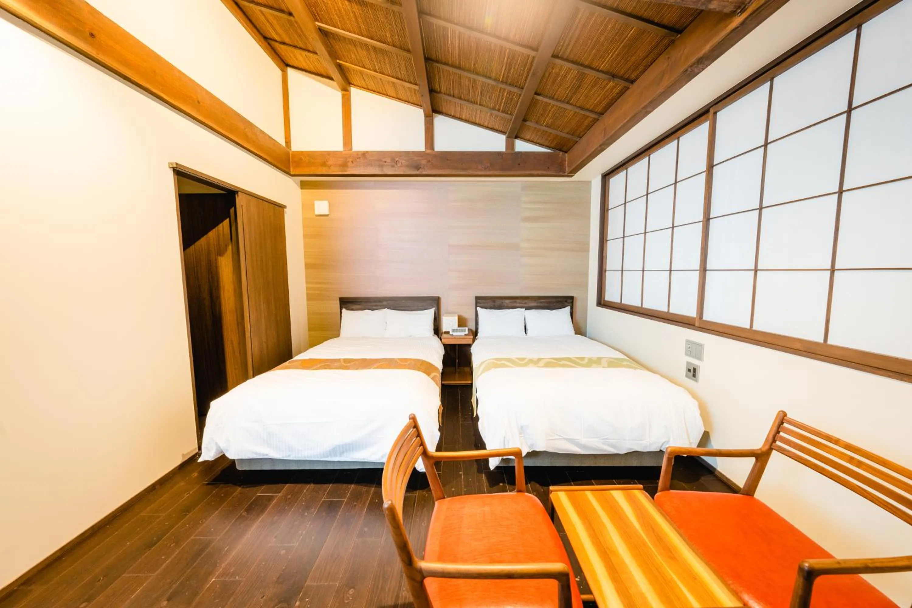 Bed in Hotel Rakurakuan