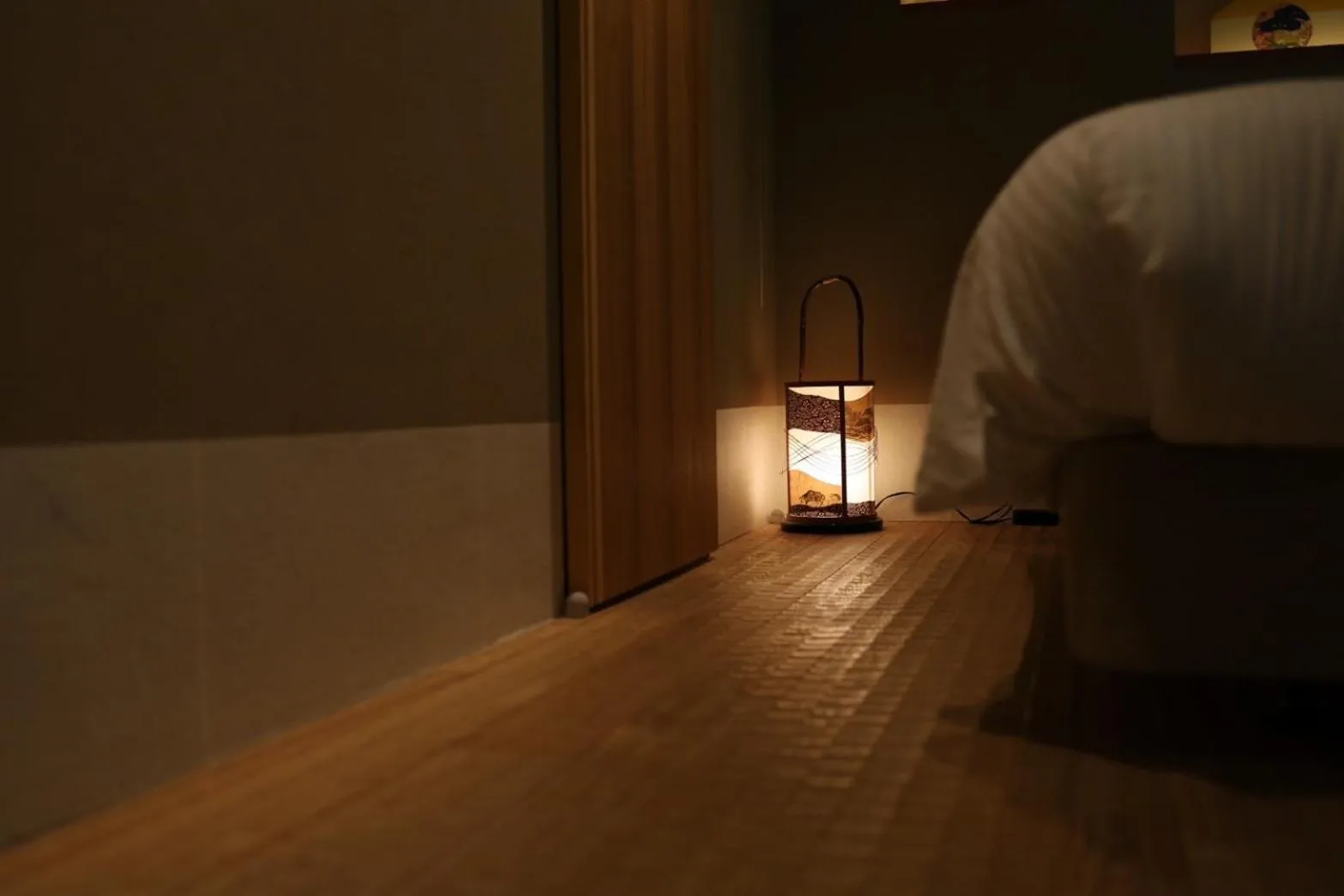 Bed in Hotel Rakurakuan